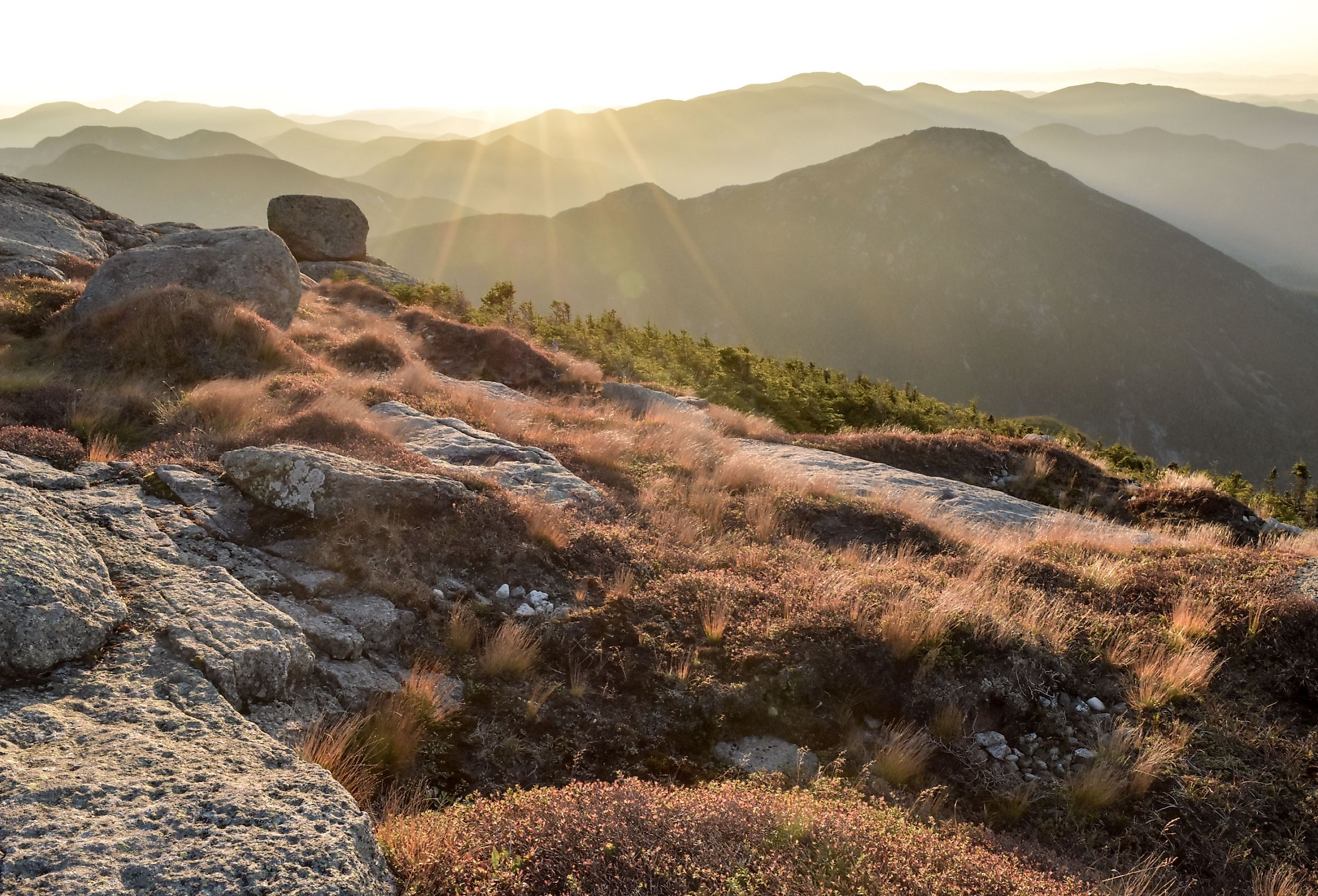 Sunrise from Mount Marcy (the tallest mountain in New York State) looking at Haystack Mountain. Image credit Josh Bukoski 1 via Shutterstock.