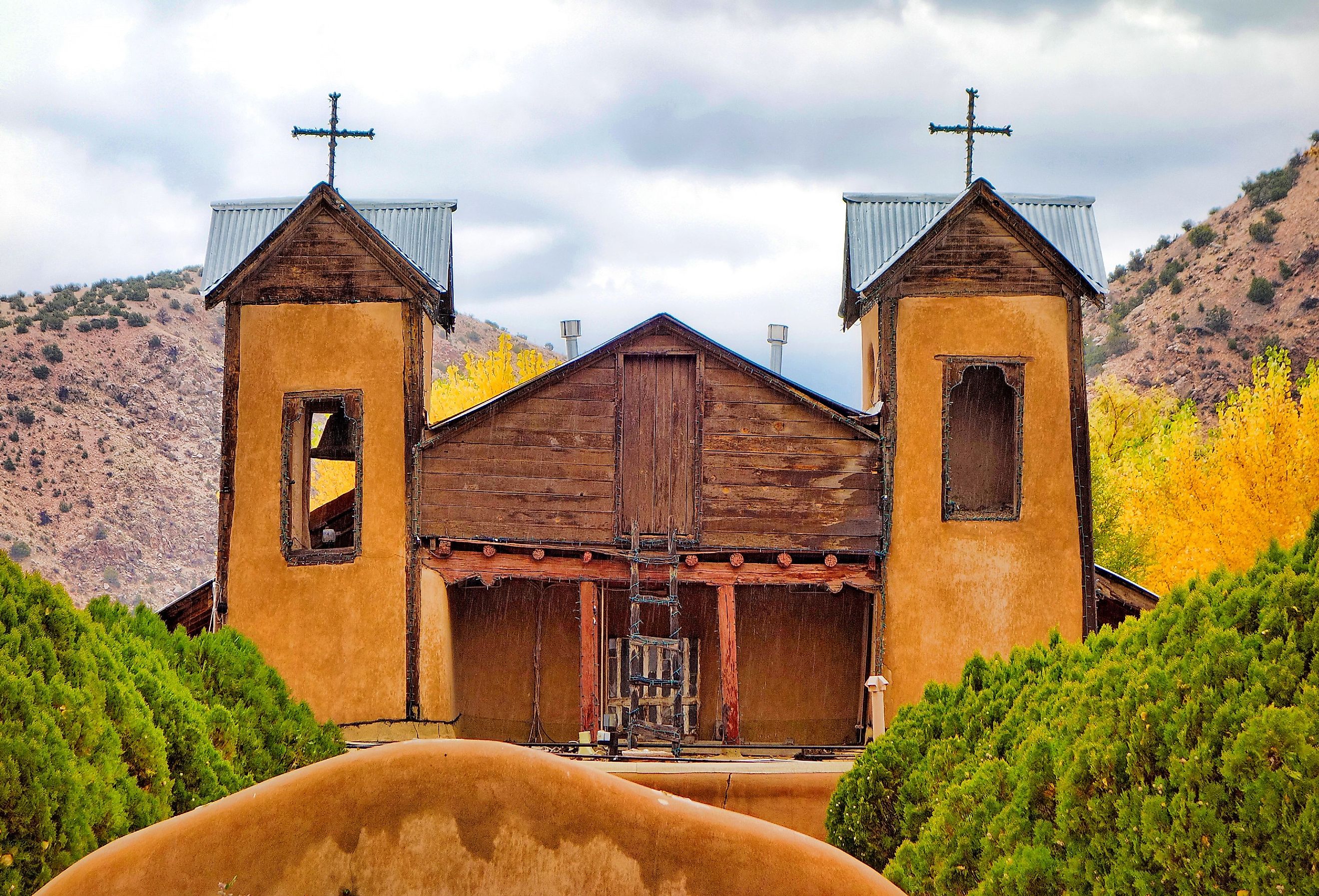 The famous historic Sanctuary of Chimayo with a garden in New Mexico, US.