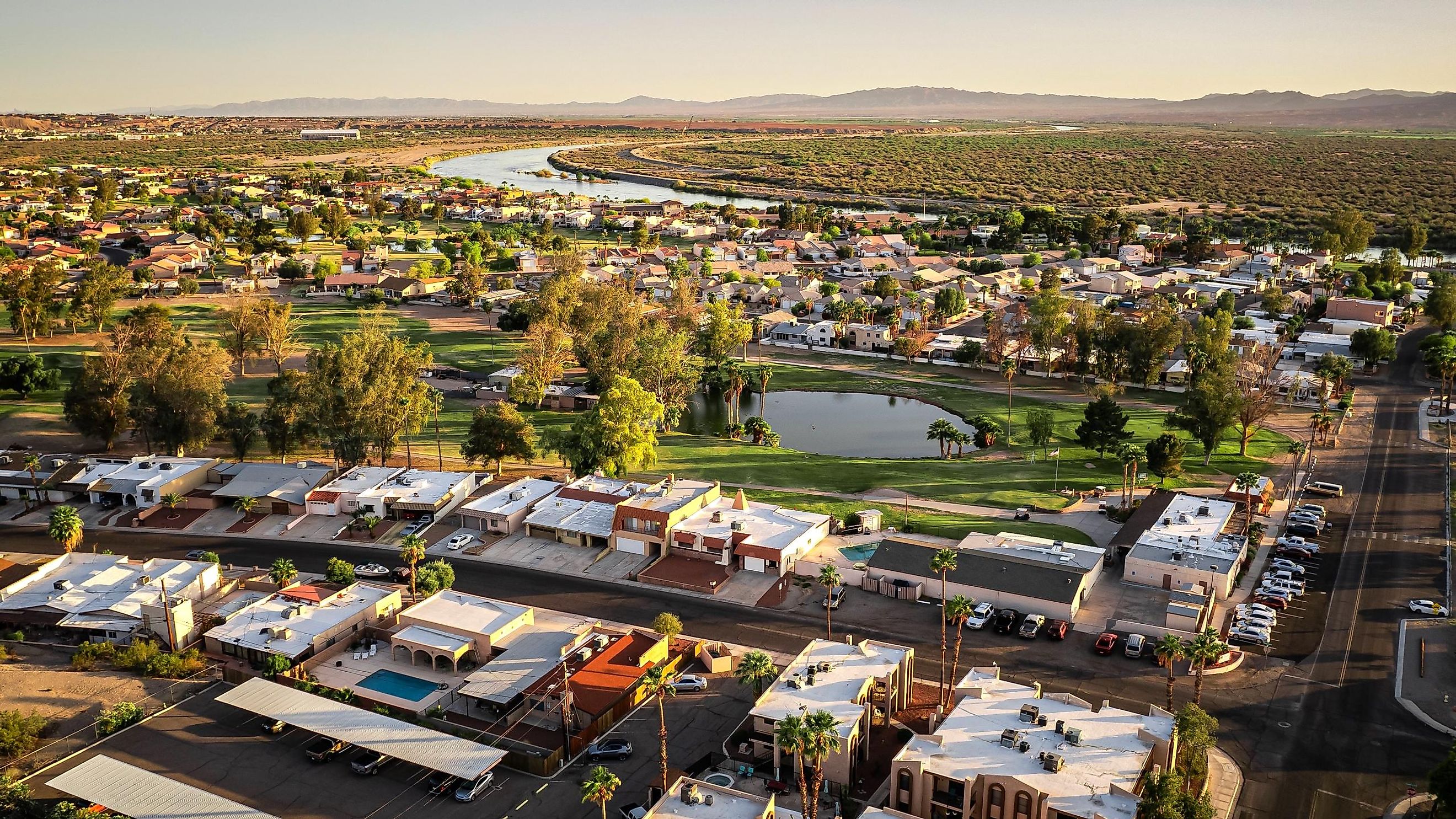 An aerial view of Bullhead City with the Colorado River flowing in the background.