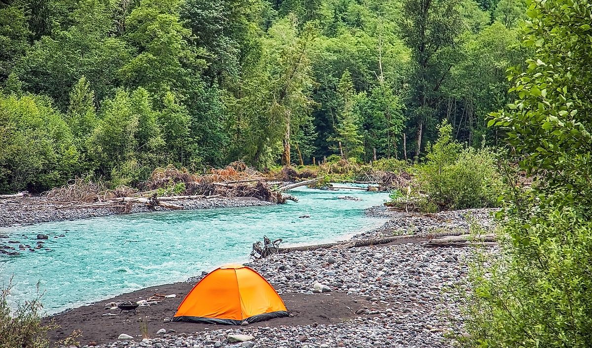 Tent on the Nisqually River in Mount Rainier National Park. Image credit: SchnepfDesign/Shutterstock.com