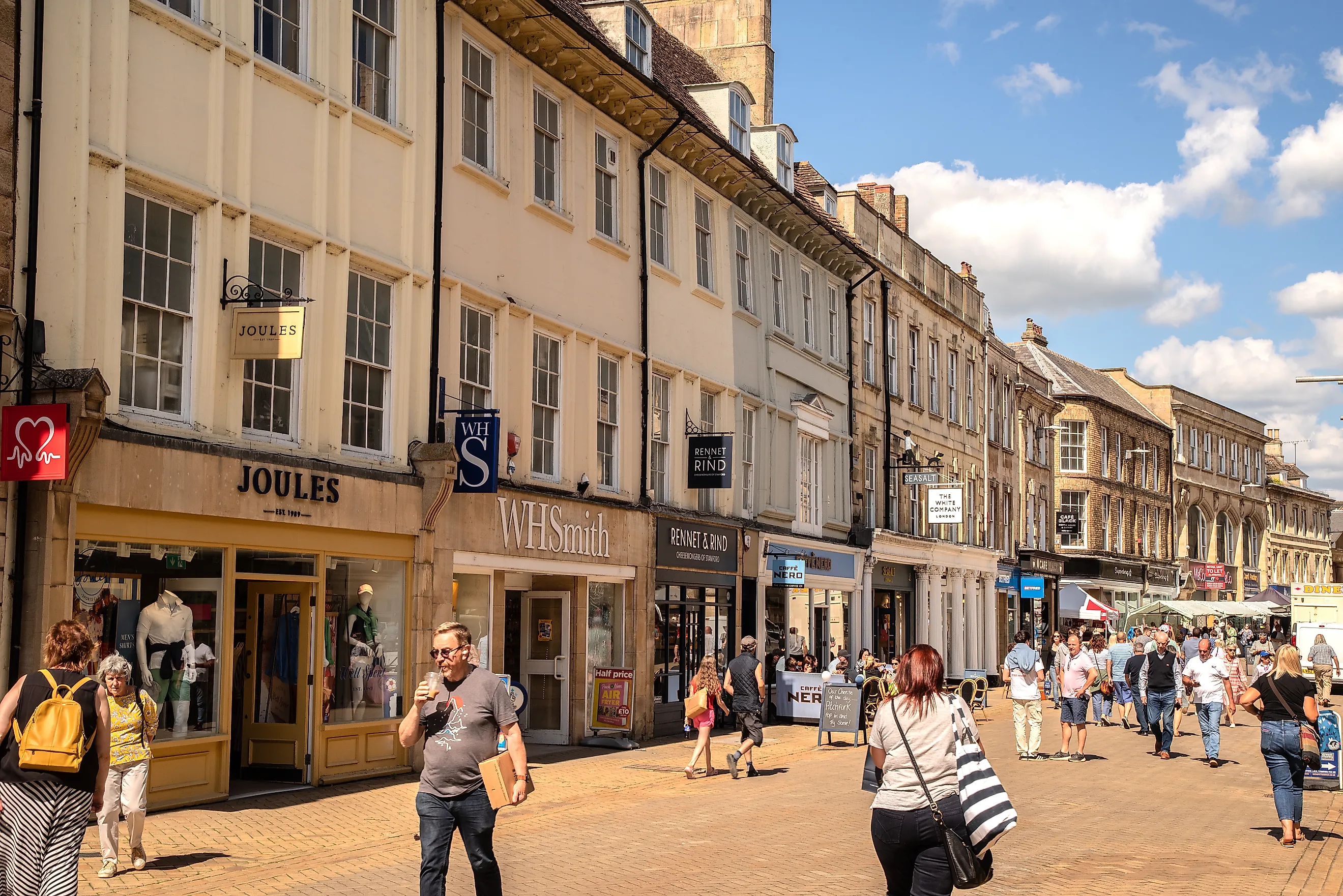 A view back along the High Street in Stamford, Lincolnshire, England. Editorial credit: Stephen Richard McAdam / Shutterstock.com