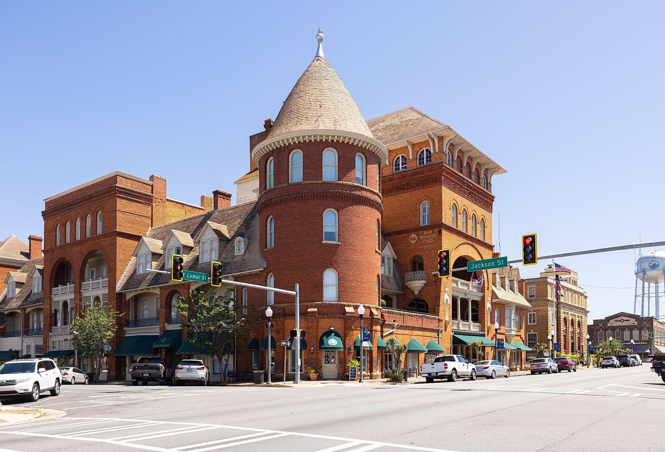 The Americus Historic District, Georgia with cars on the street and the water tower in the distance. Image credit Roberto Galan via Shutterstock