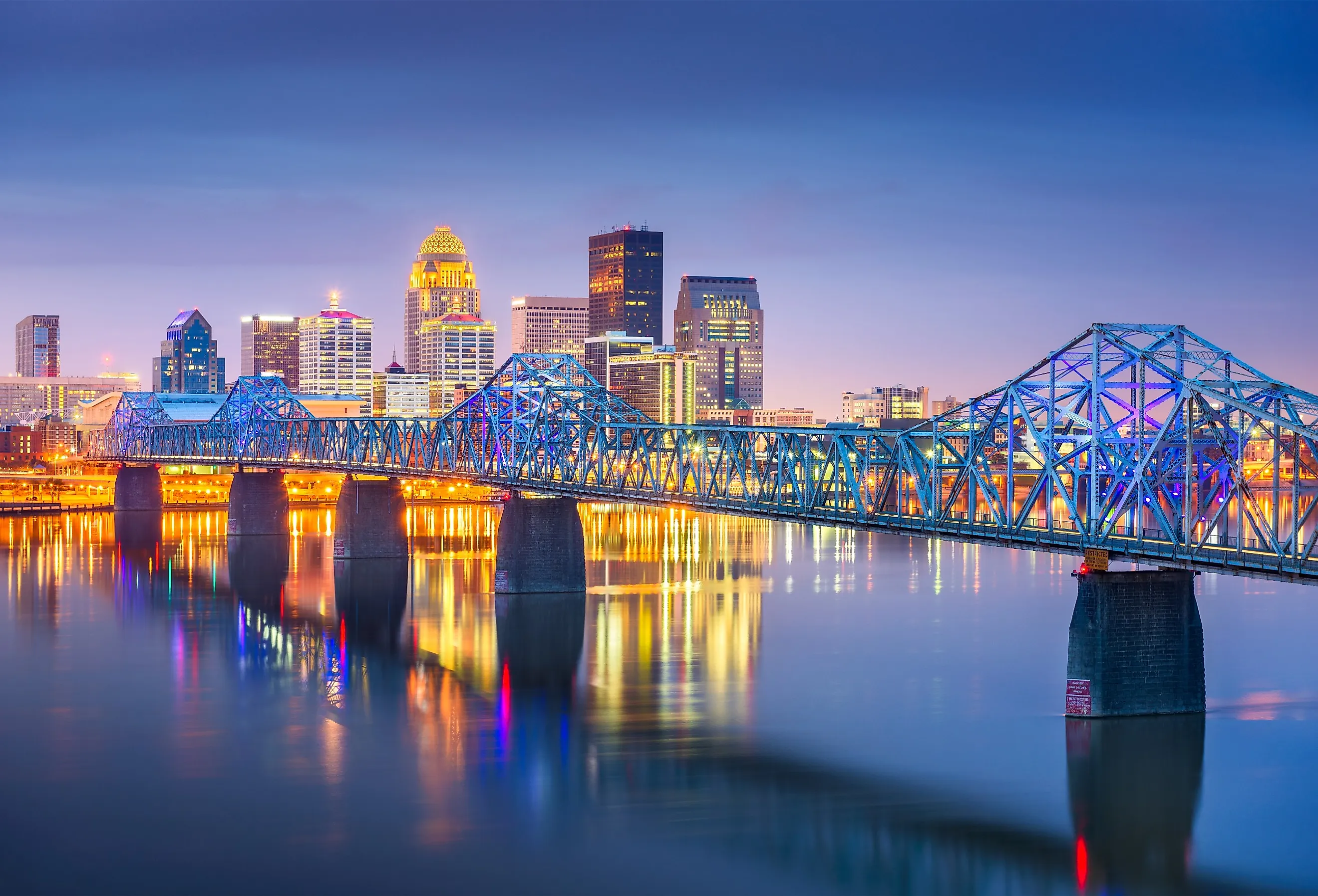 Colorful bridges lead into the buildings and streets of downtown city center Louisville, Kentucky.