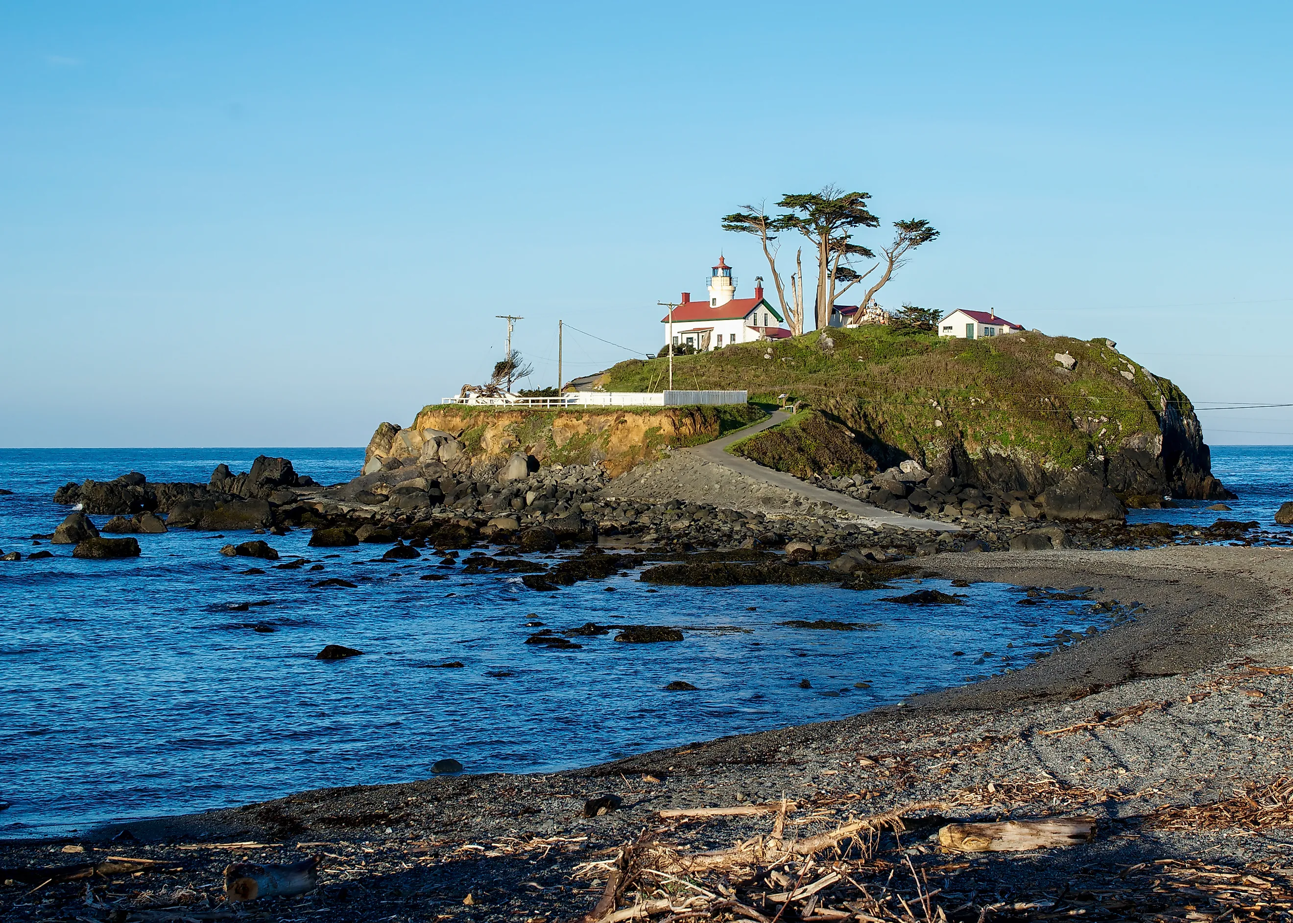 Battery Point Lighthouse in Crescent City, California, USA, during a low tide, in the early morning.