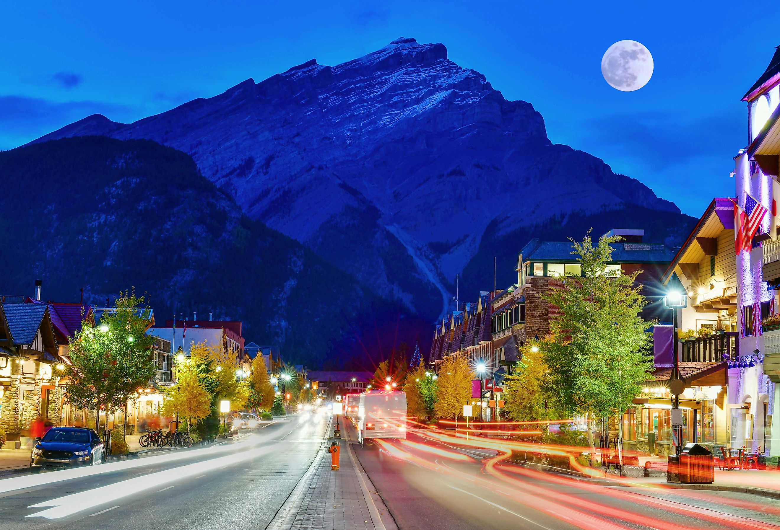 Street view of famous Banff Avenue at twilight time. 
