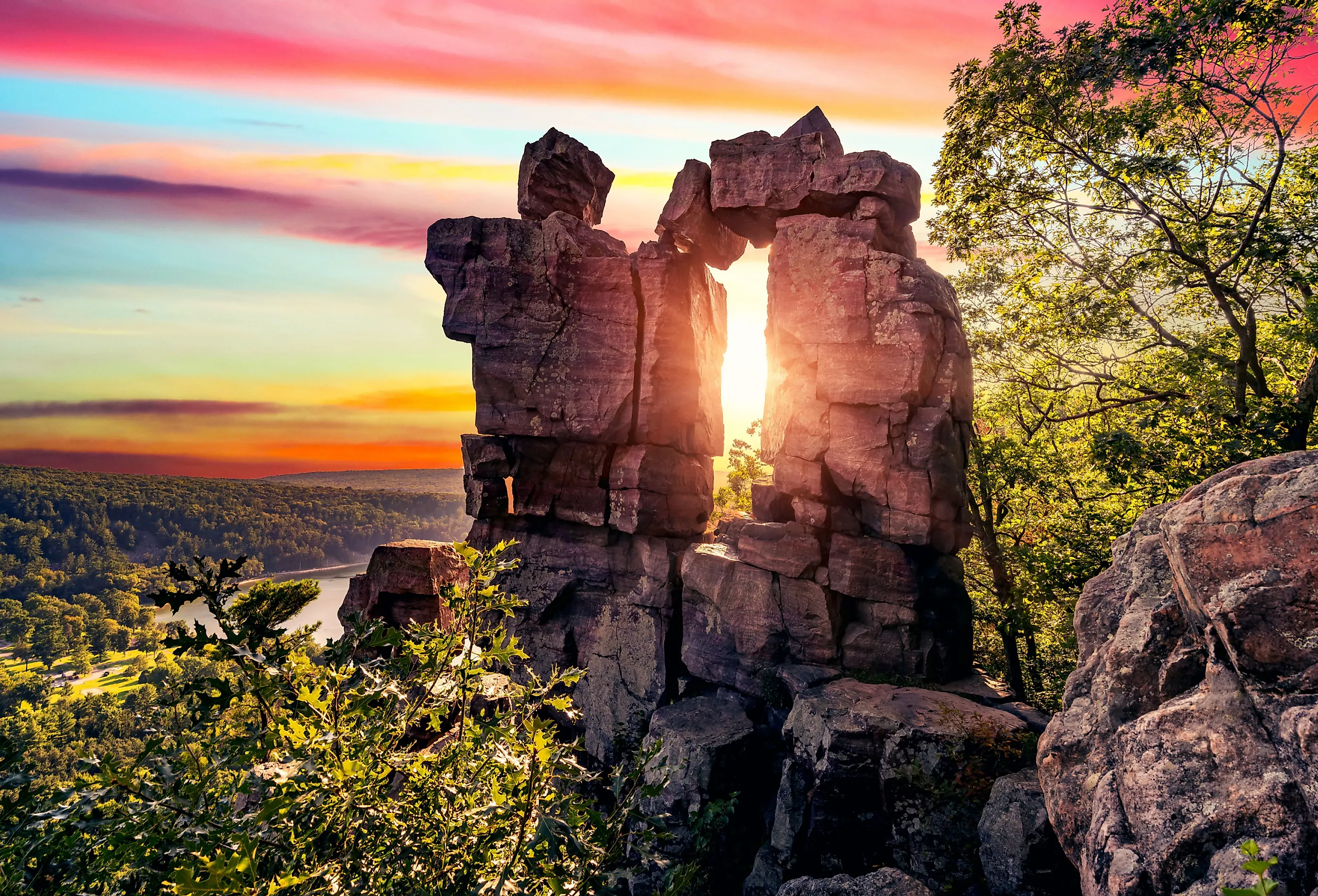 Sunset through Devil's Doorway in Devil's Lake State Park, Baraboo, Wisconsin USA.