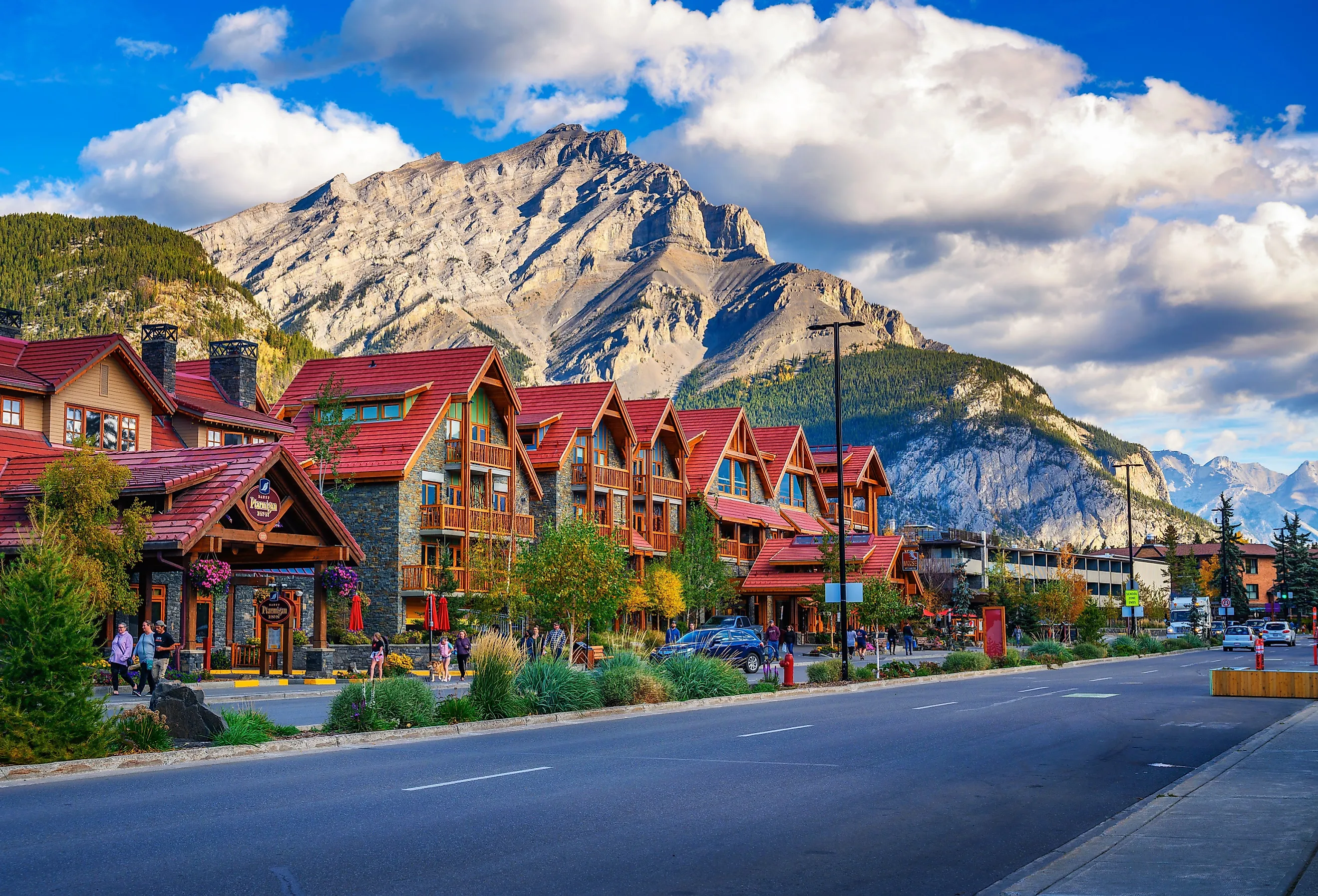 Scenic street view of Banff Avenue with cars and tourists, Banff, Alberta. Image credit Nick Fox via Shutterstock