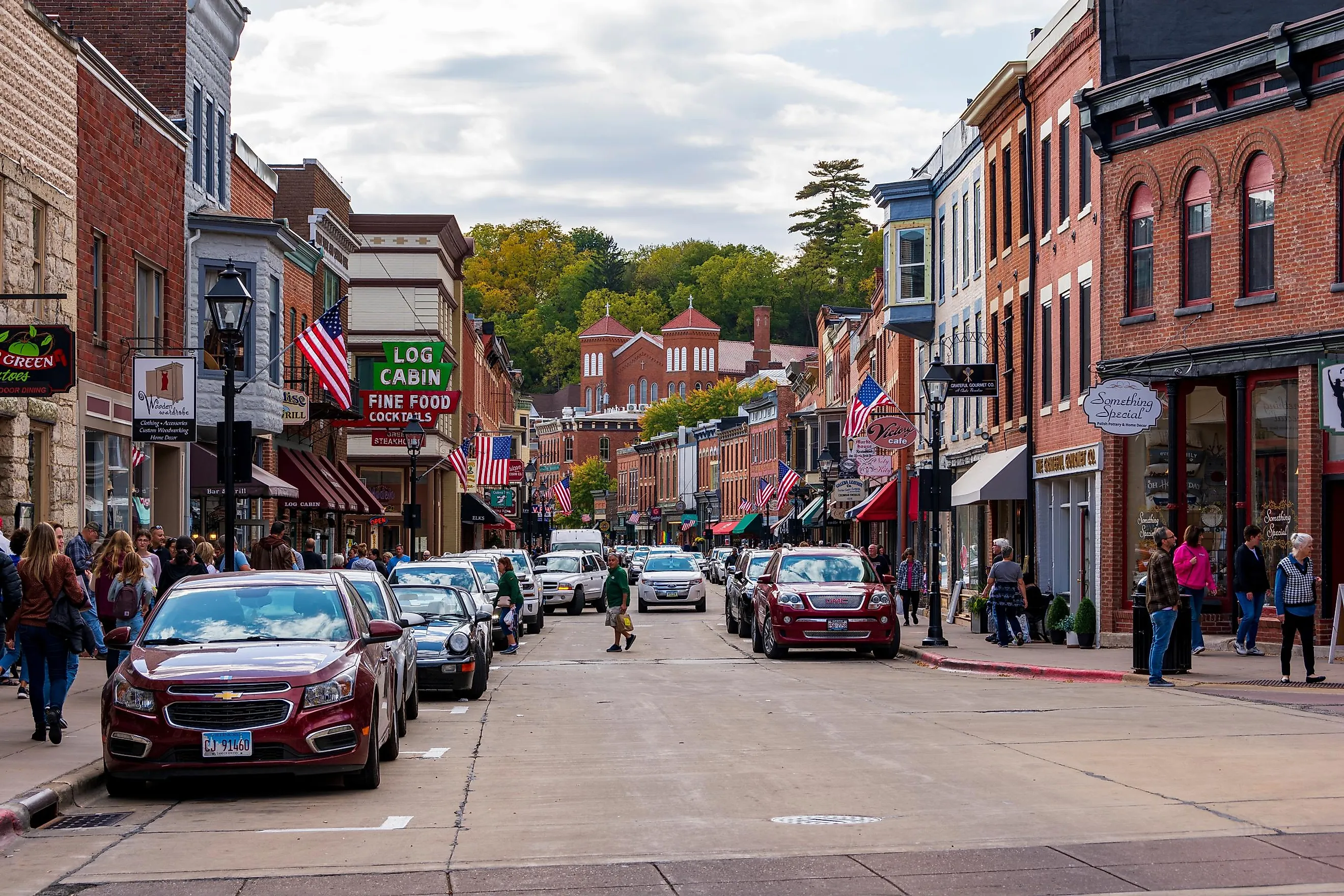 Busy Main Street in the historic downtown area of Galena, Illinois, USA, bustling with cars and people. Editorial credit: Dawid S Swierczek / Shutterstock.com