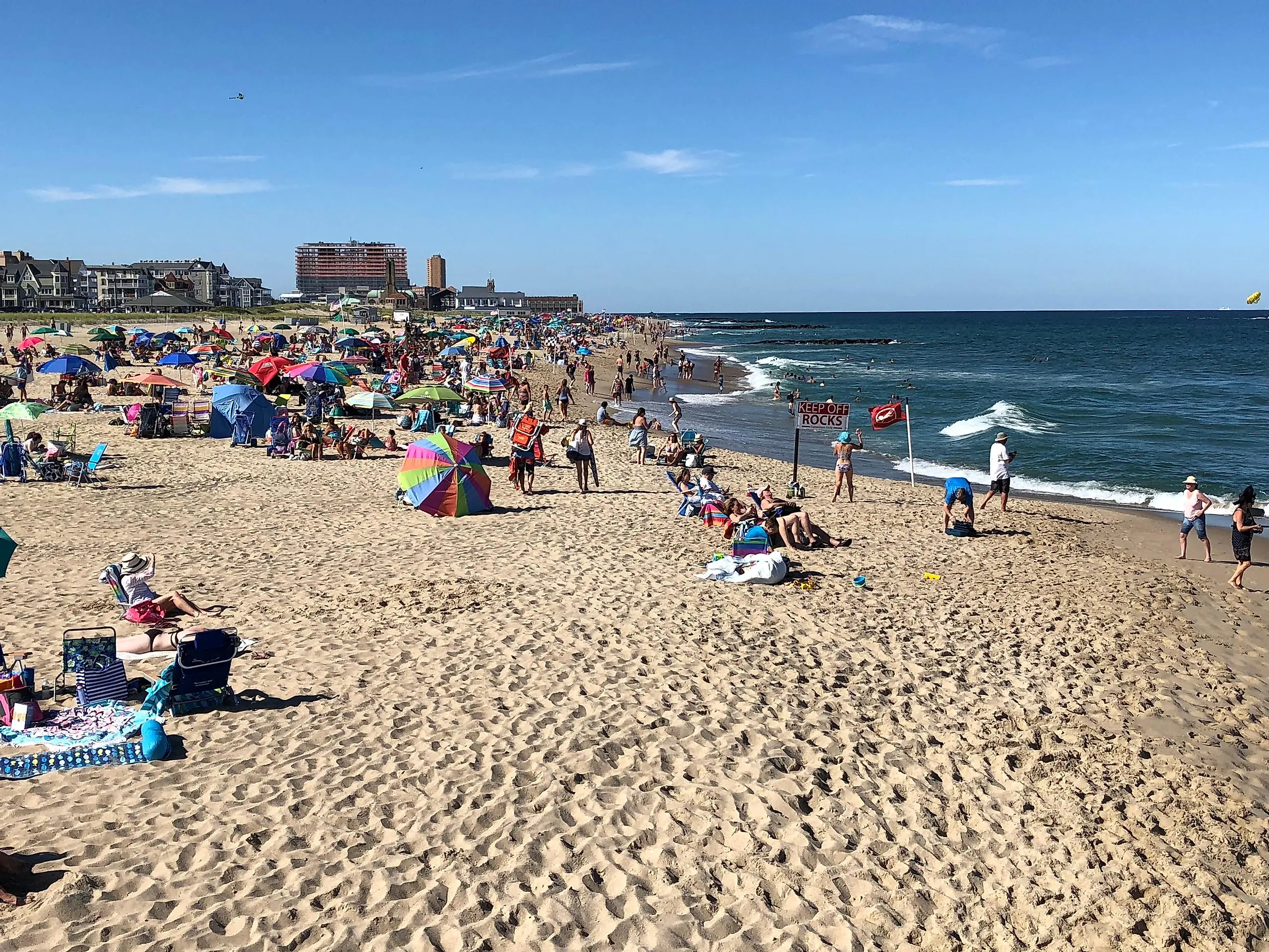 Ocean Grove, New Jersey. Summer day, The people on the beach are doing activities with them family.