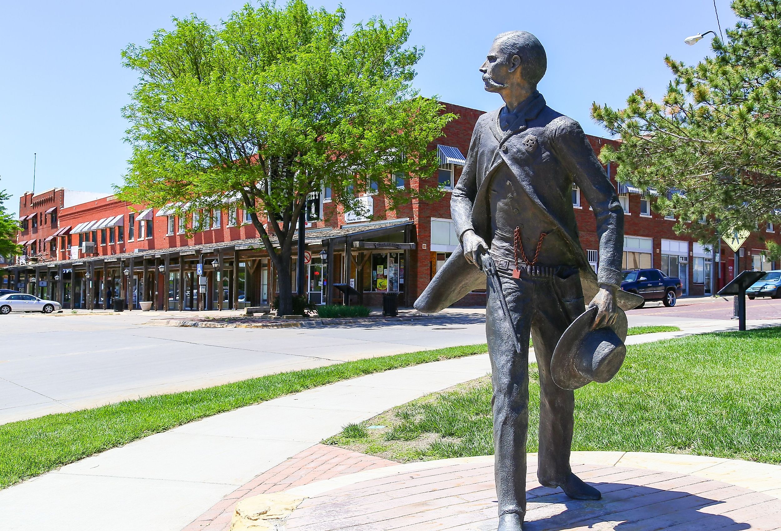 Bronze sculpture of Wyatt Earp as part of the Trail of Fame in the historic district of Dodge City, Kansas. Image credit Michael Rosebrock via Shutterstock.com