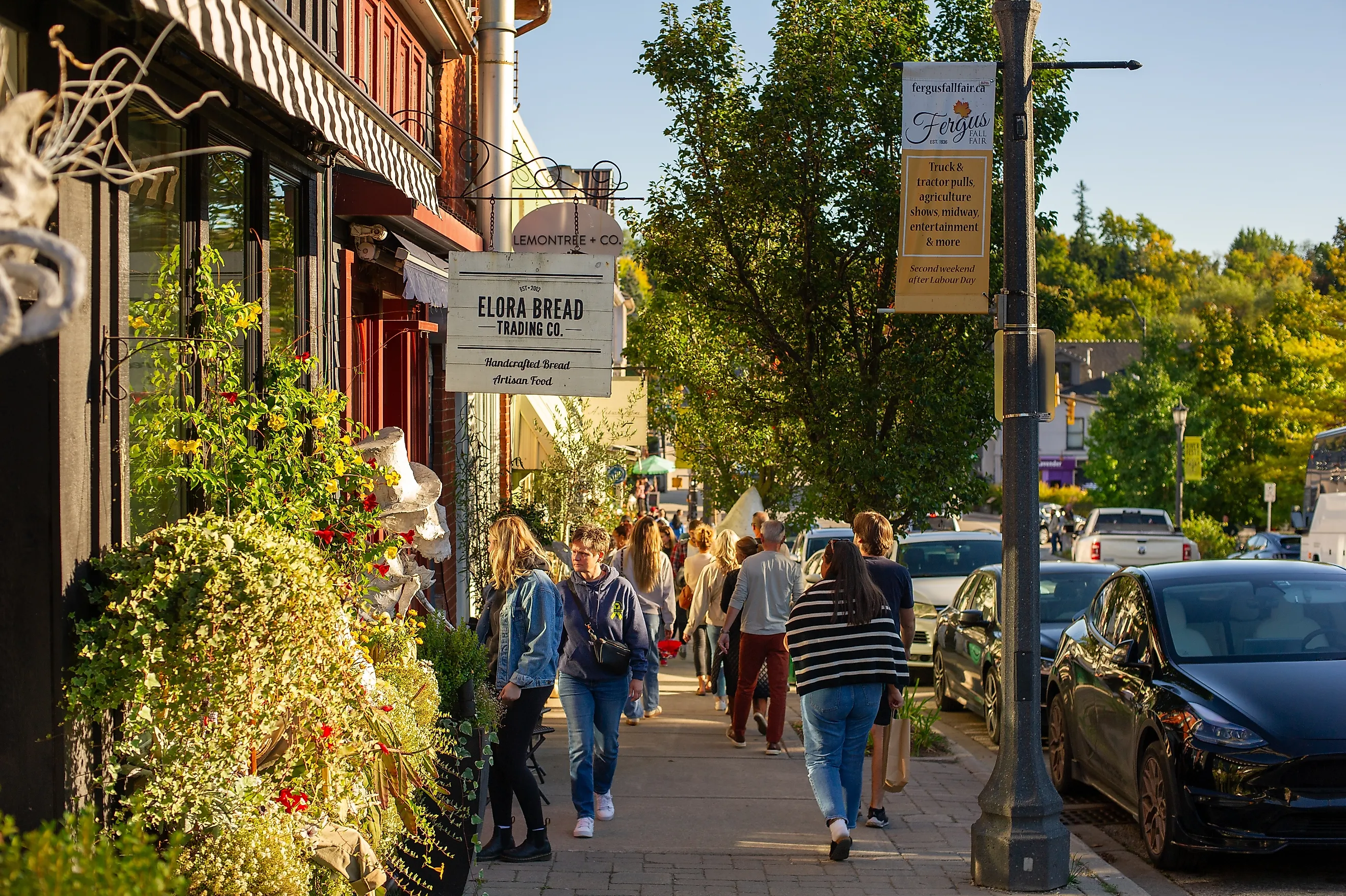 People stroll through the charming streets of Elora, Ontario. (Image credit: Alessandro Cancian / Shutterstock.com.)