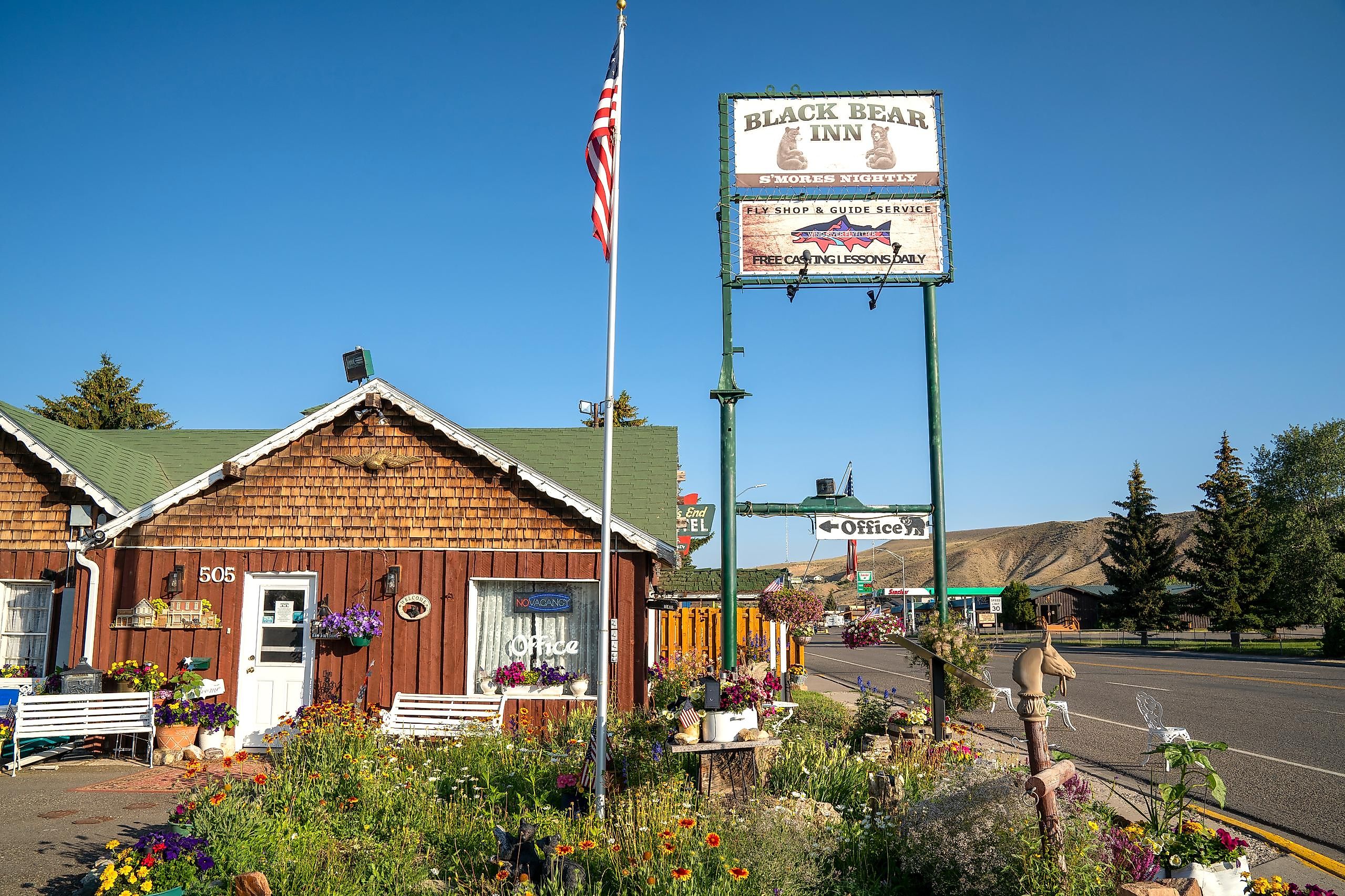 Sign and office for the Black Bear Inn, a small motel in downtown Dubois, Wyoming. Image credit melissamn via Shutterstock