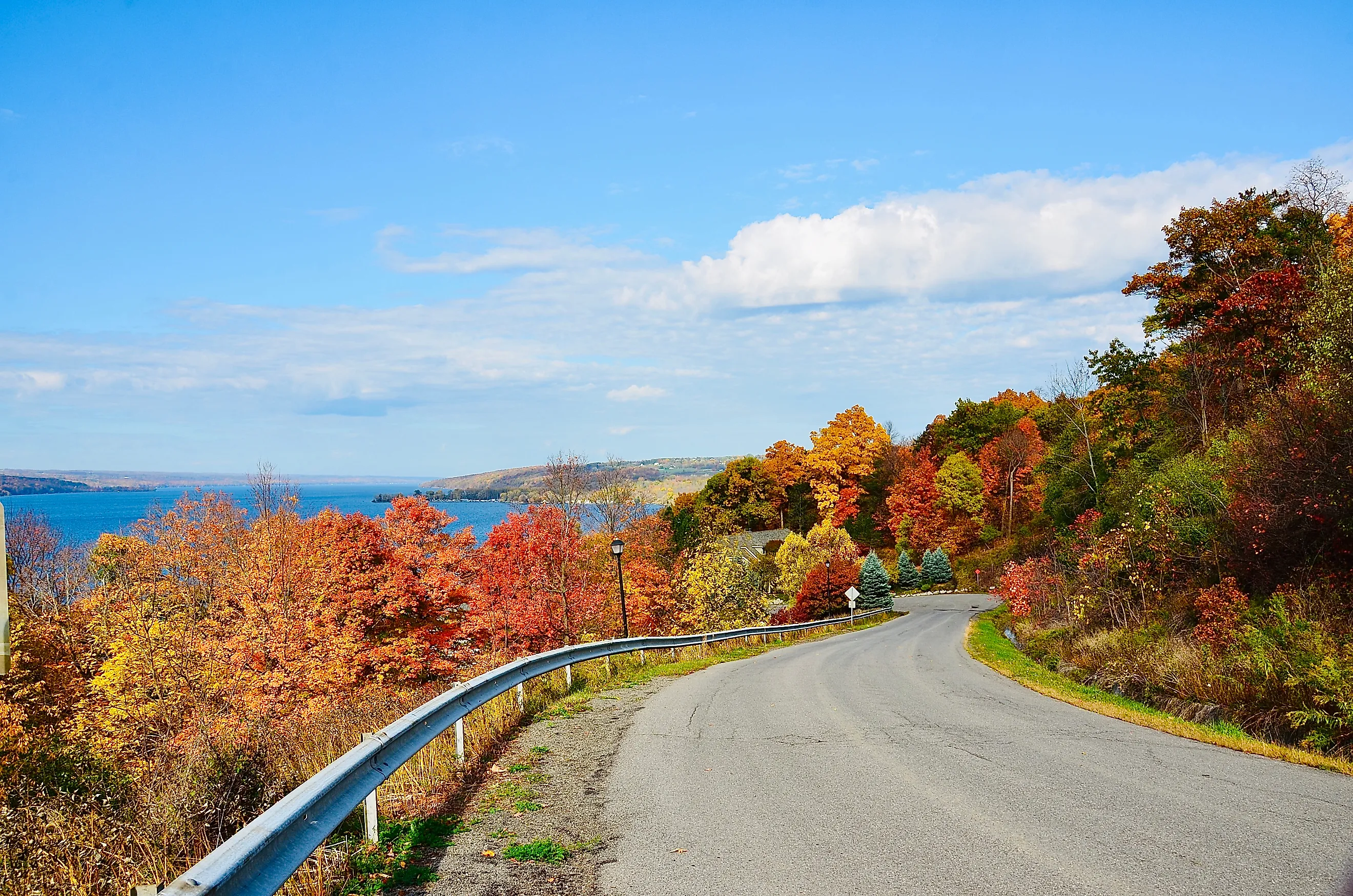 Scenic drive overlooking Cayuga Lake, the longest of New York's Finger Lakes. Credit: PQK / Shutterstock