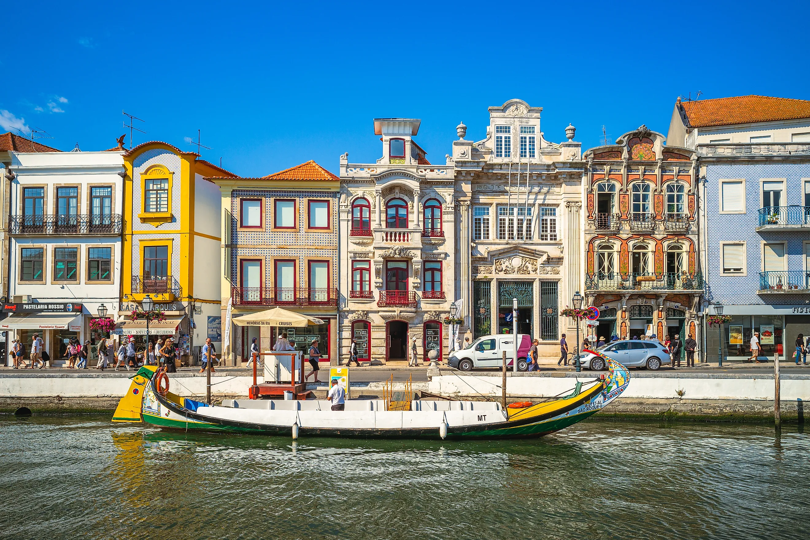 Boat on Canal and Art Nouveau, Novo, buildings in Aveiro in Portugal. (Editorial credit: Richie Chan / Shutterstock.com)