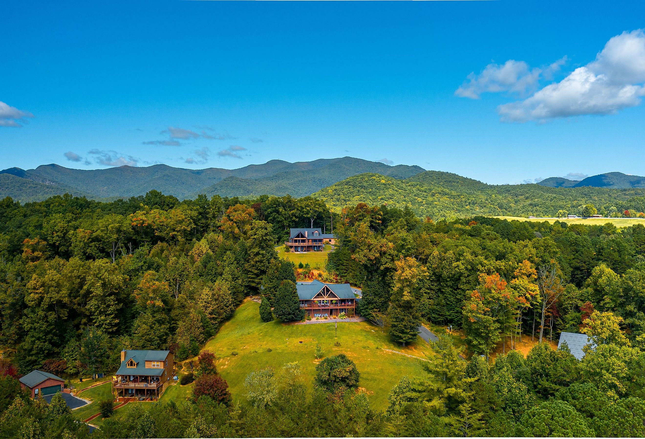 Aerial view of small town Blue Ridge in Georgia with the Blue Ridge Mountains in the background.