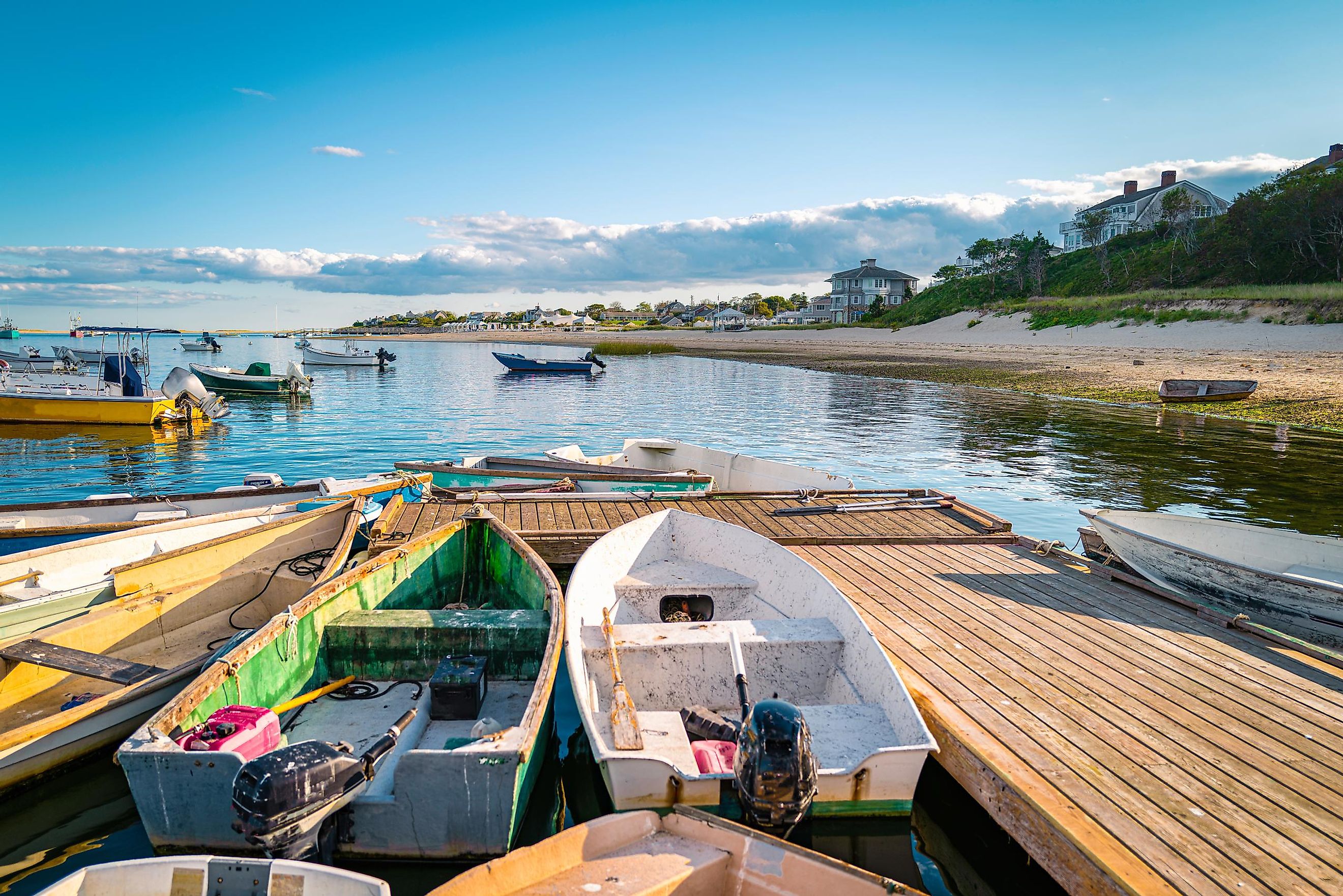 Boats and dinghies moored in the commercial dock in Chatham, Massachusetts