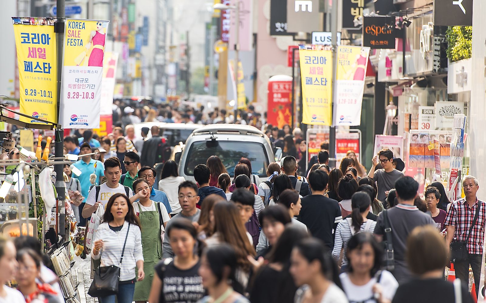 Young people walk the streets of Seoul, South Korea. Savvapanf Photo / Shutterstock.com.