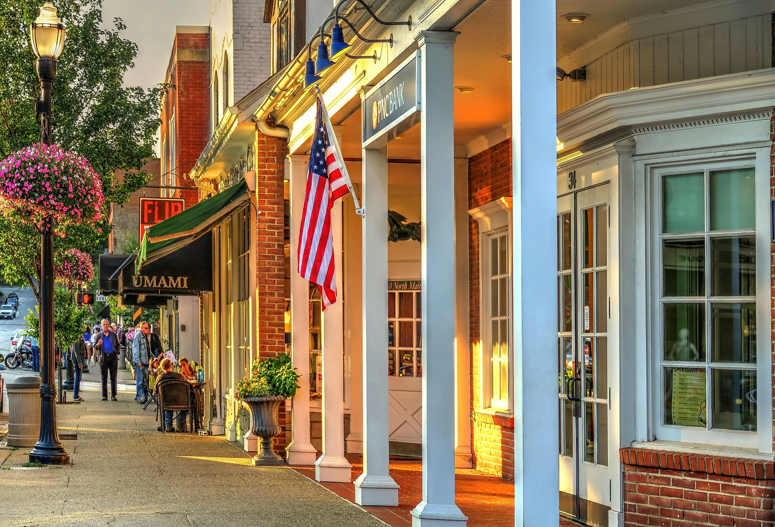 Downtown Chagrin Falls, Ohio, with people dining on Main Street. Image credit Lynne Neuman via Shutterstock.