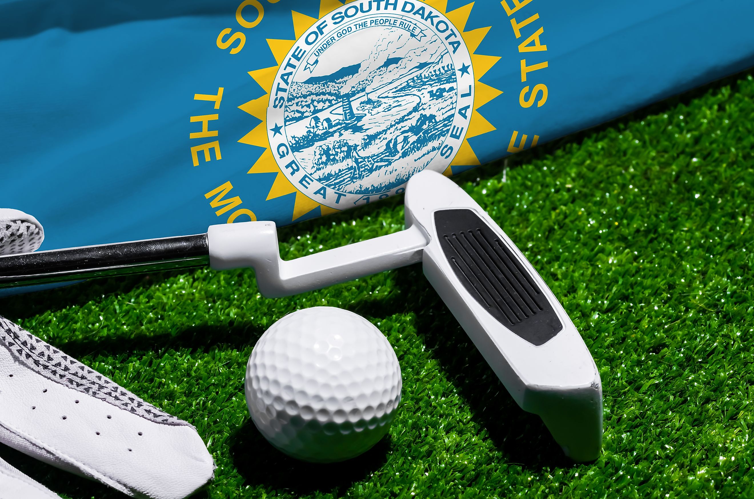 A golf ball and club in South Dakota.