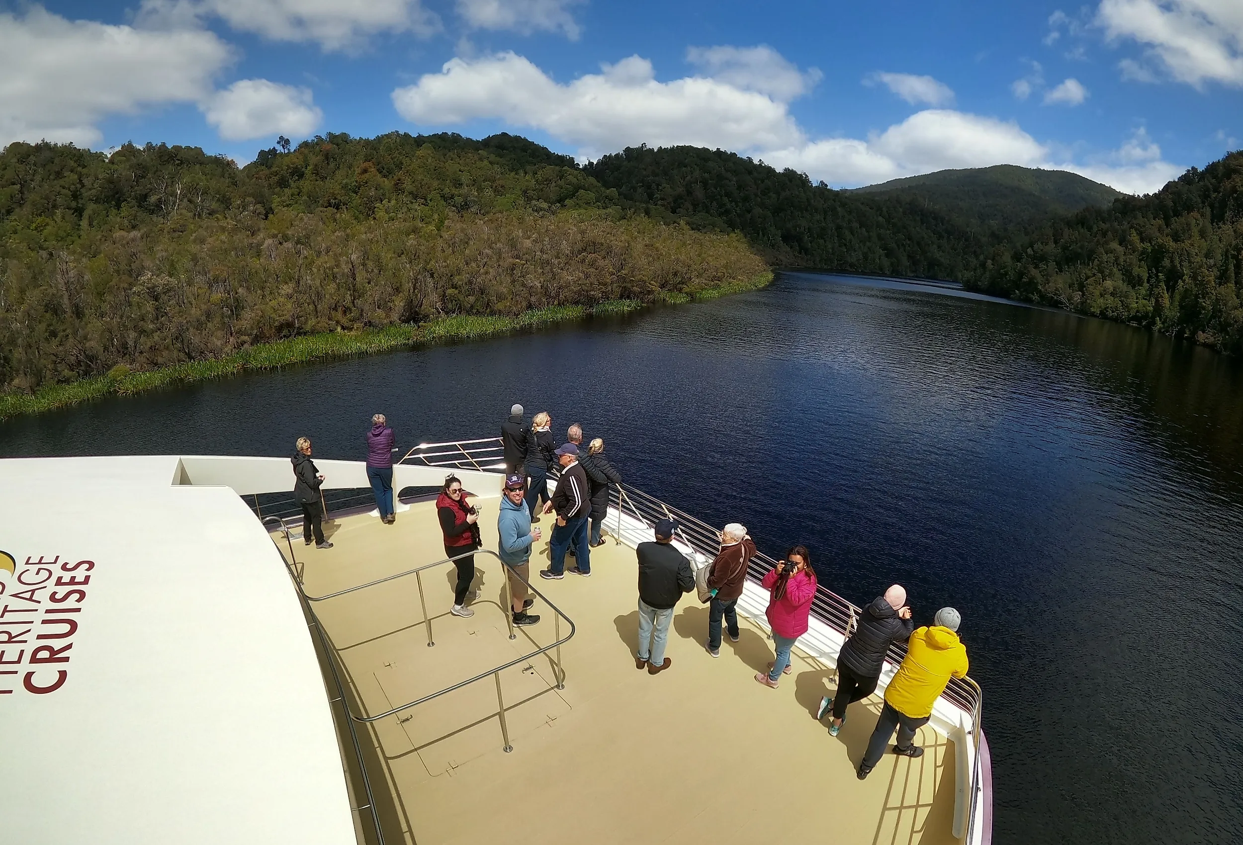 People enjoying the World Heritage Cruises in Strahan, Tasmania, Australia