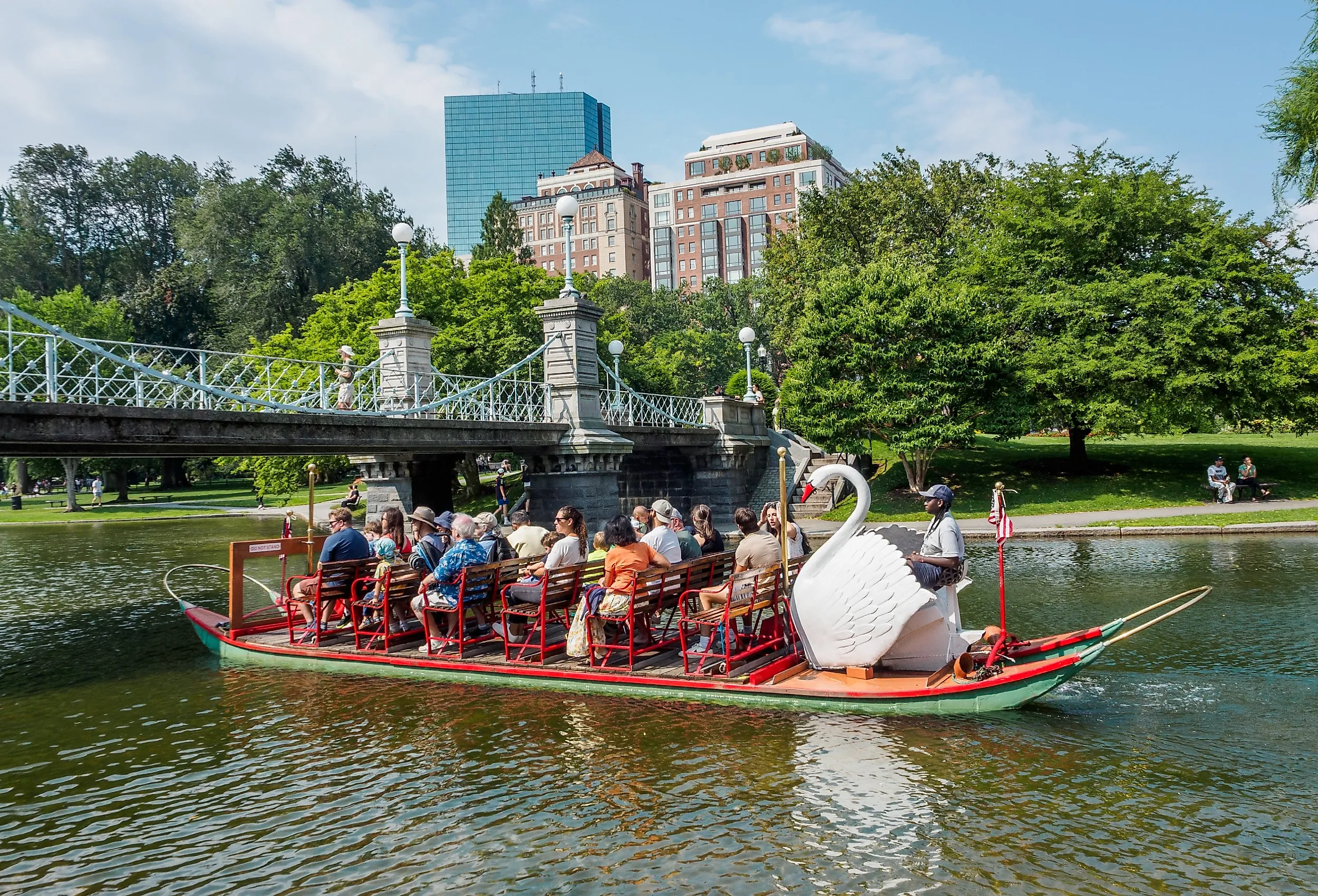 The famous swan boats at the Public Garden in Boston, Massachusetts. Image credit bodhichita via Shutterstock