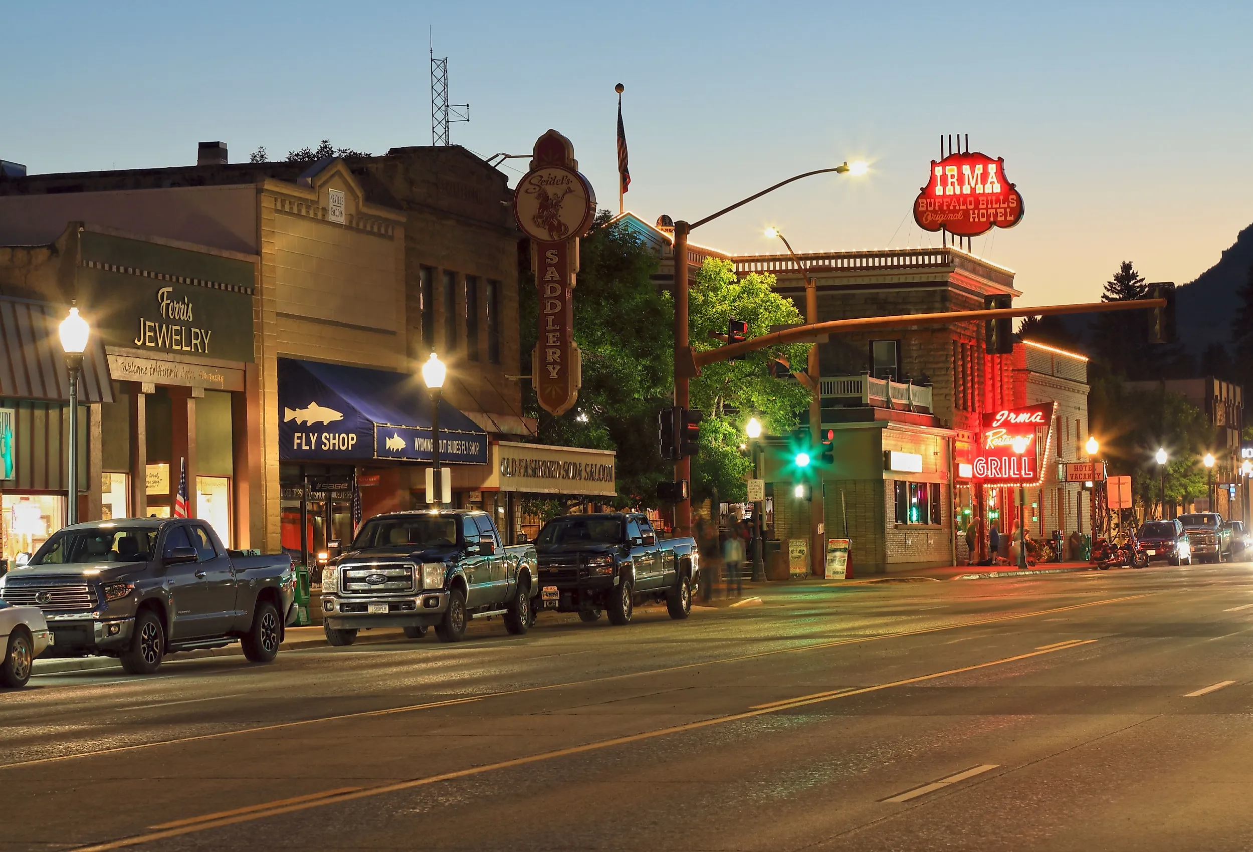Buffalo Bills Irma Hotel and Restaurant in Sheridan Ave at dusk in Cody, Wyoming. Image credit: Fotogro via Shutterstock.
