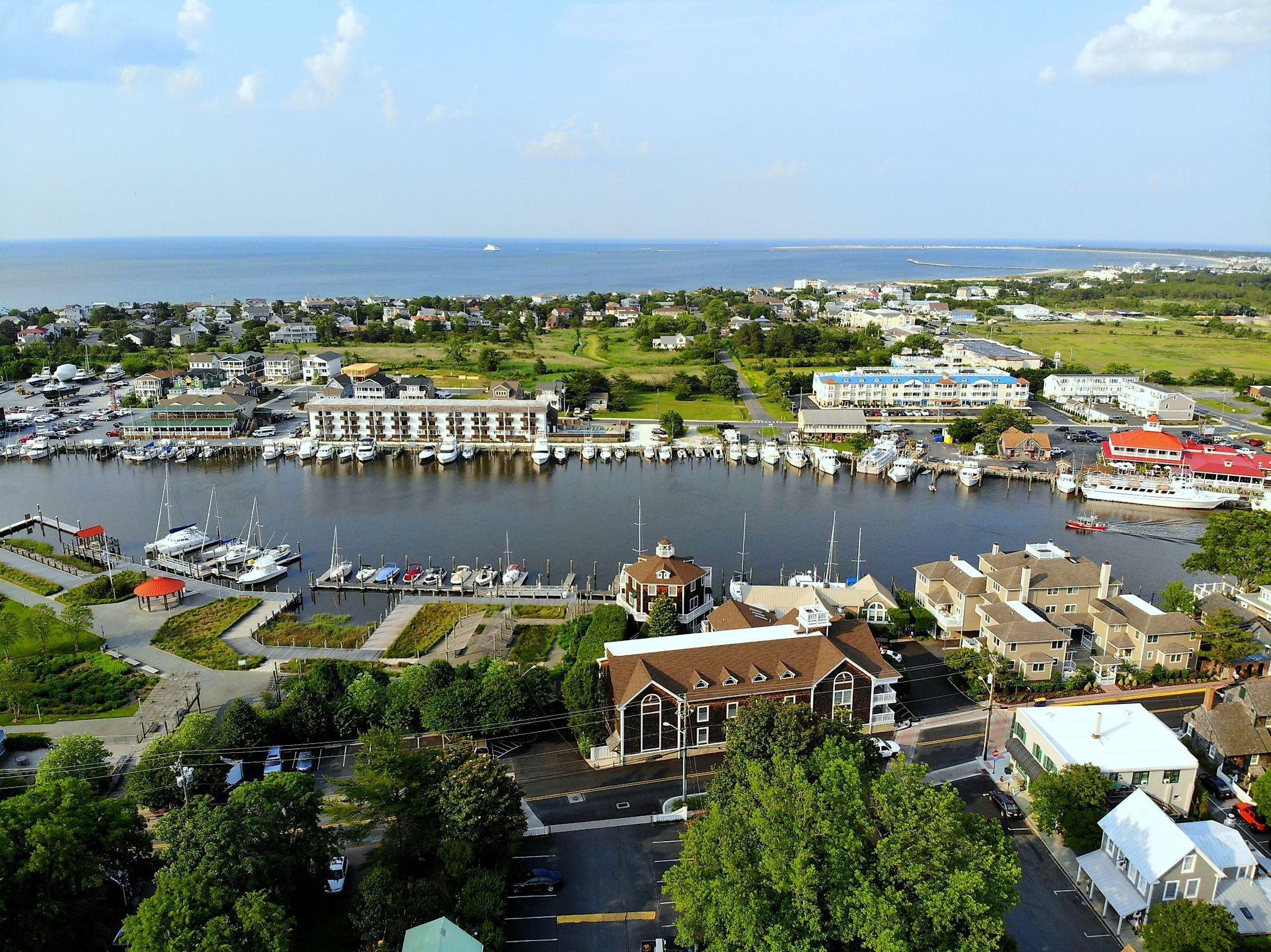 The aerial view of the beach town, fishing port, and waterfront residential homes along the canal in Lewes, Delaware. Editorial credit: Khairil Azhar Junos / Shutterstock.com