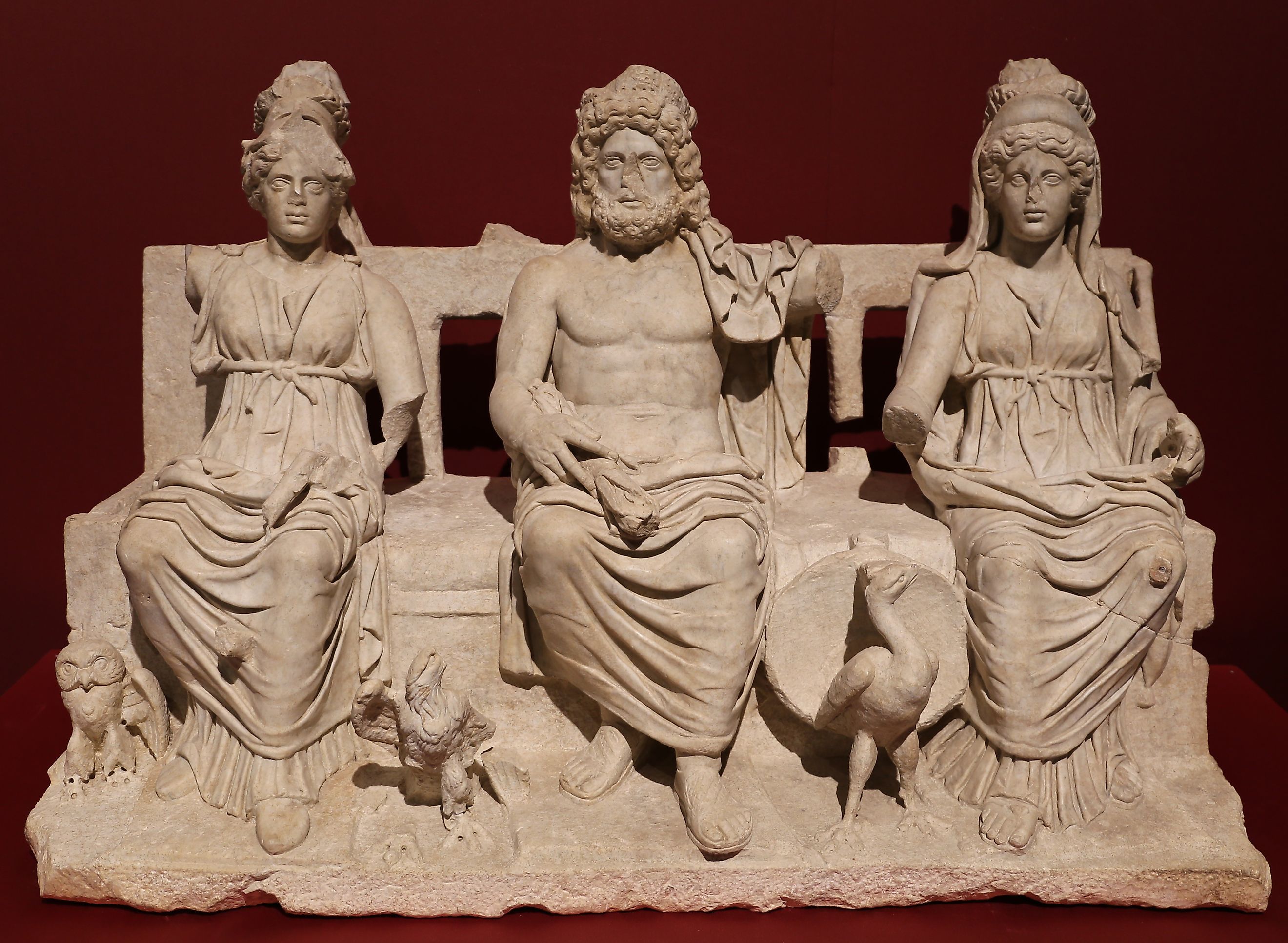 Capitoline Triad of Juno, Jupiter, and Minerva, ancient Roman deities.