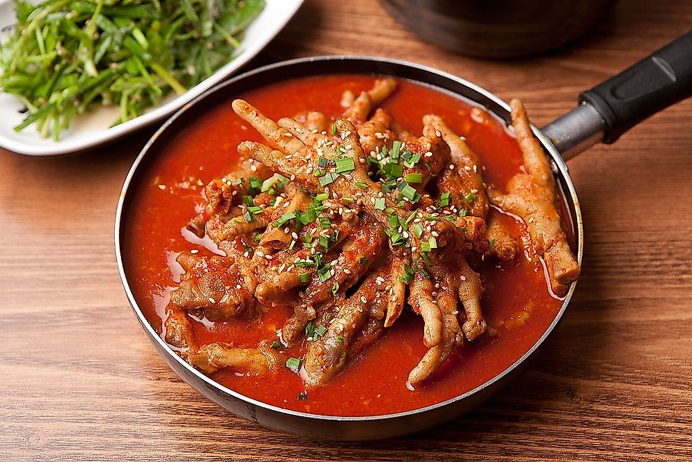 A Korean pub dish consisting of spicy chicken feet.