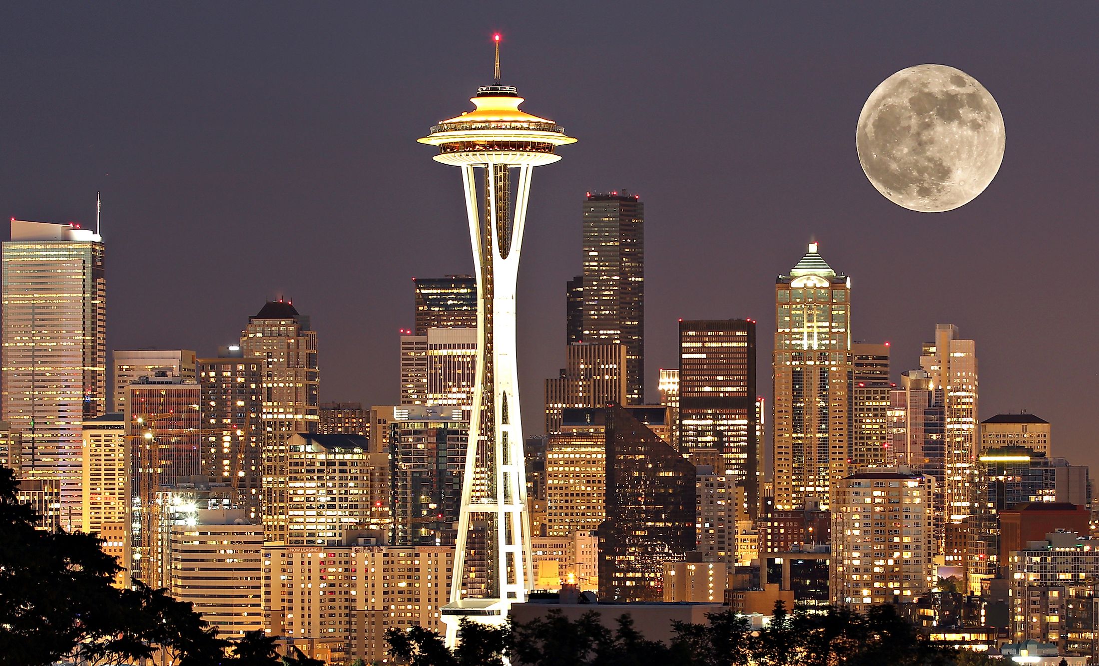 Skyline of Seattle on a full moon night.
