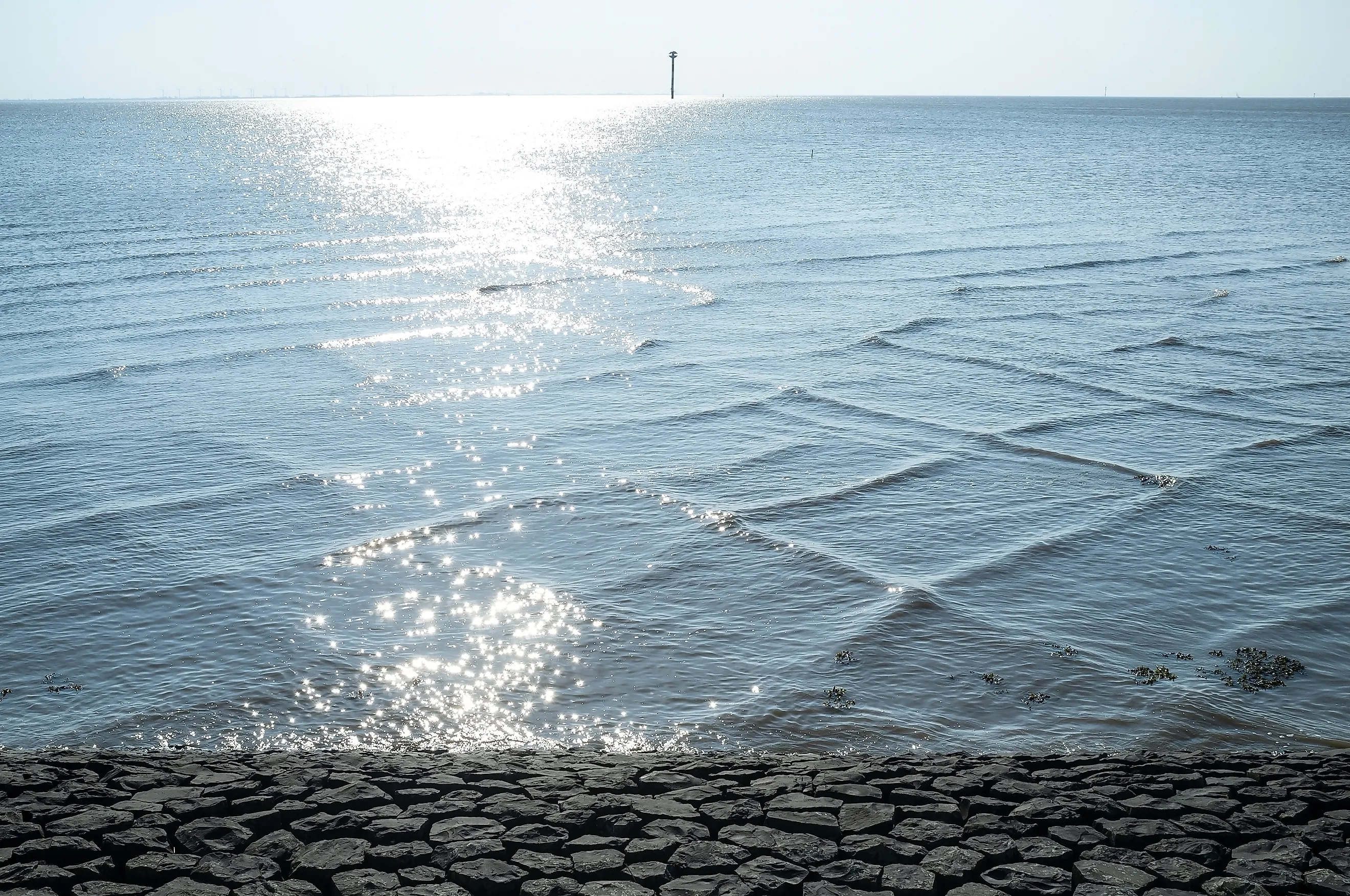 A cross sea is caused by two sets of waves converging at different angles.