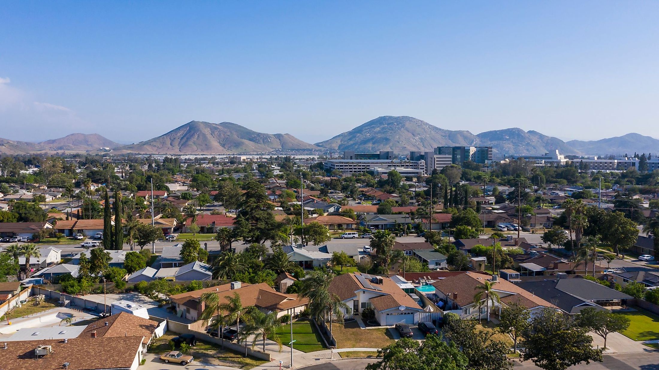 Daytime aerial view of the city center of Fontana, California. 