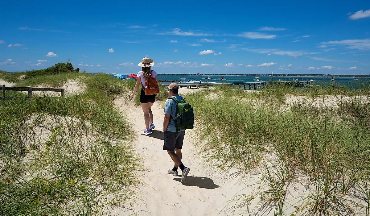 Enjoy a getaway on North Carolina's Outer Banks, like the couple pictured here.