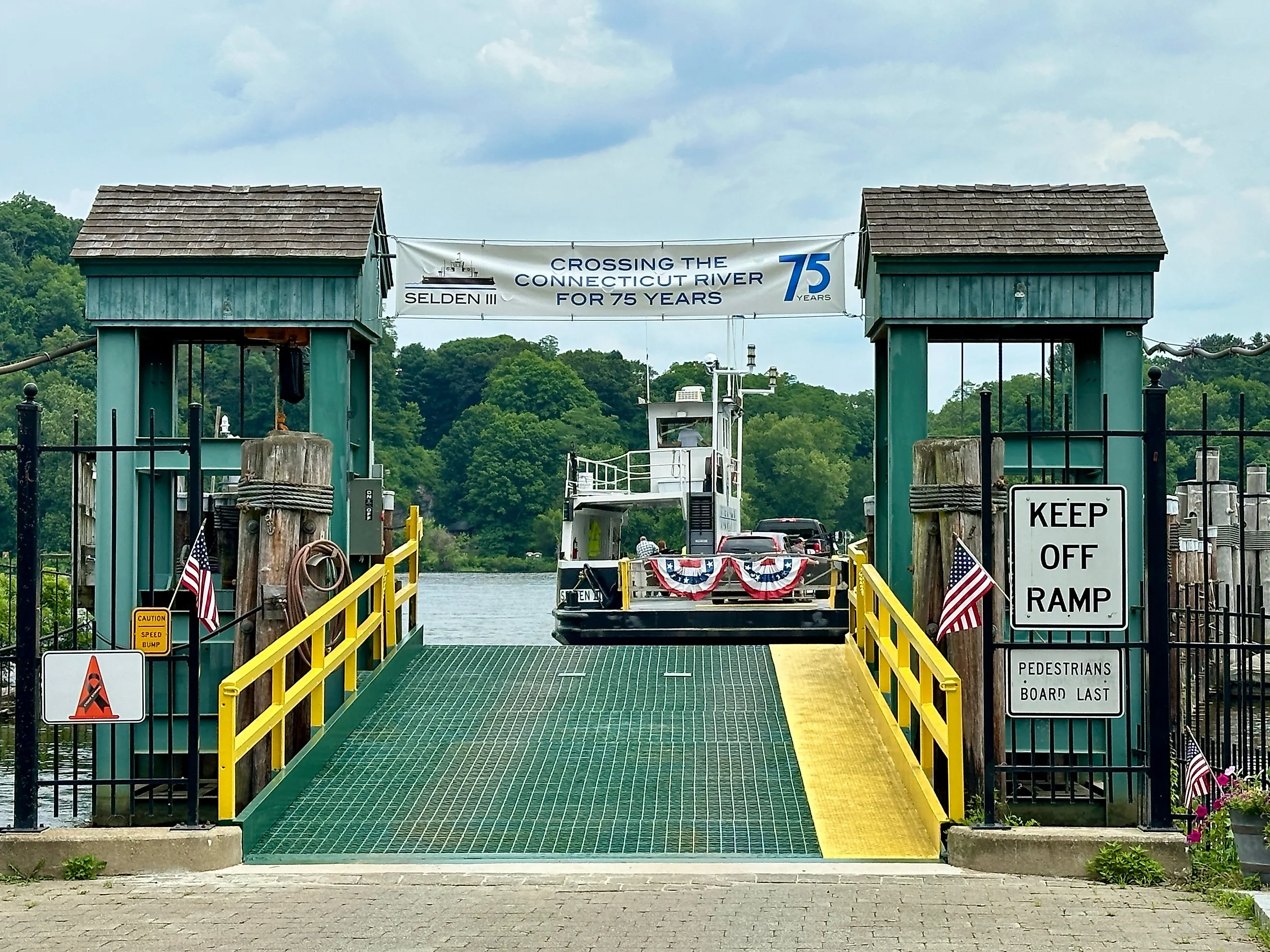 reen gate for Chester-Hadlyme Ferry with boat heading off to the other shore. Second oldest ferry in continuous use in CT. Editorial credit: Rachel Rose Boucher / Shutterstock.com 