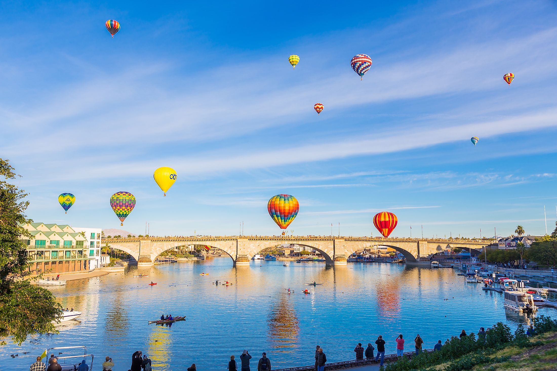 Hot air balloons flying above London Bridge in Lake Havasu. 