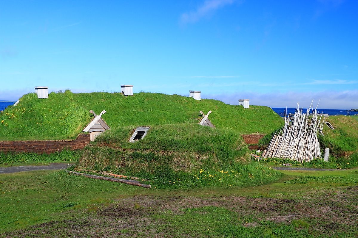Ancient homes of Viking settlers in L'Anse aux Meadows National Historic Site on the island of Newfoundland, Canada. Image credit: George Burba/Shutterstock.com