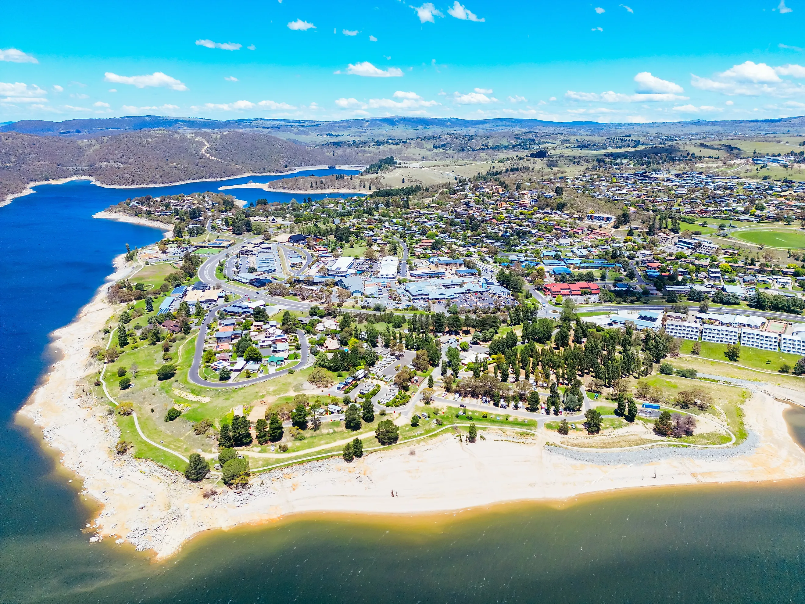 The view over the town of Jindabyne and Lake Jindabyne on a warm sunny summer's day in New South Wales, Australia. 