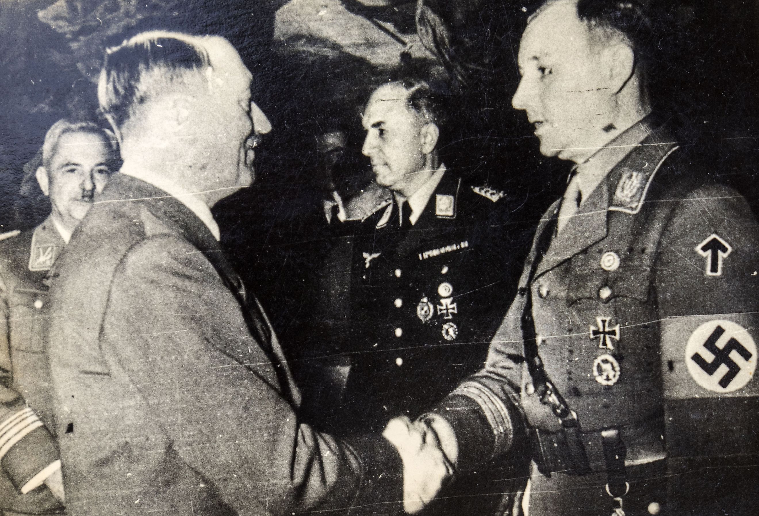 Adolf Hitler shakes hands with Victor Lutz, Chief of Staff of the SA after murder of Ernst Rohm. Image credit IgorGolovniov via Shutterstock