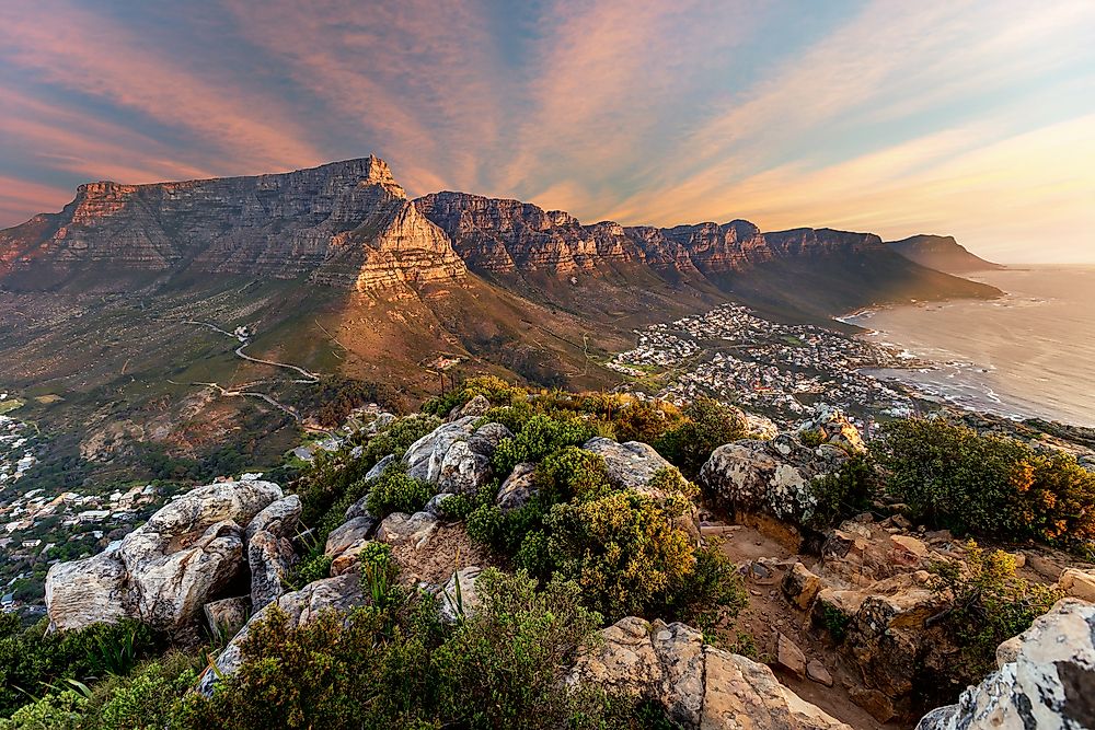 A sunset over Table Mountain, a mountain near Cape Town, South Africa, in the region of southern Africa.
