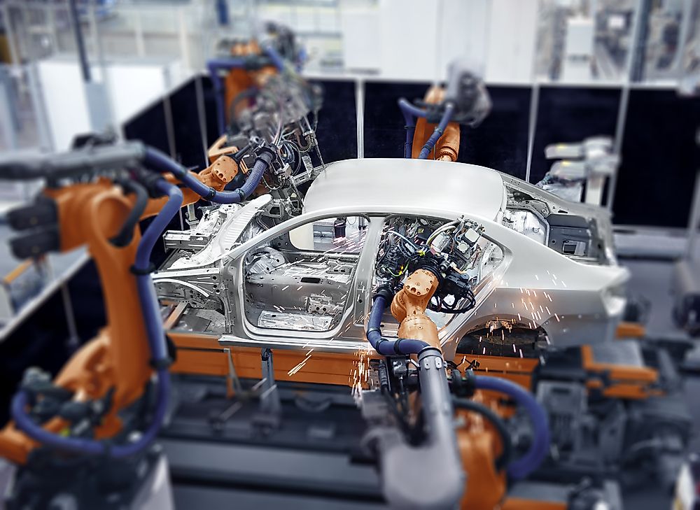 A car being manufactured on an assembly line.