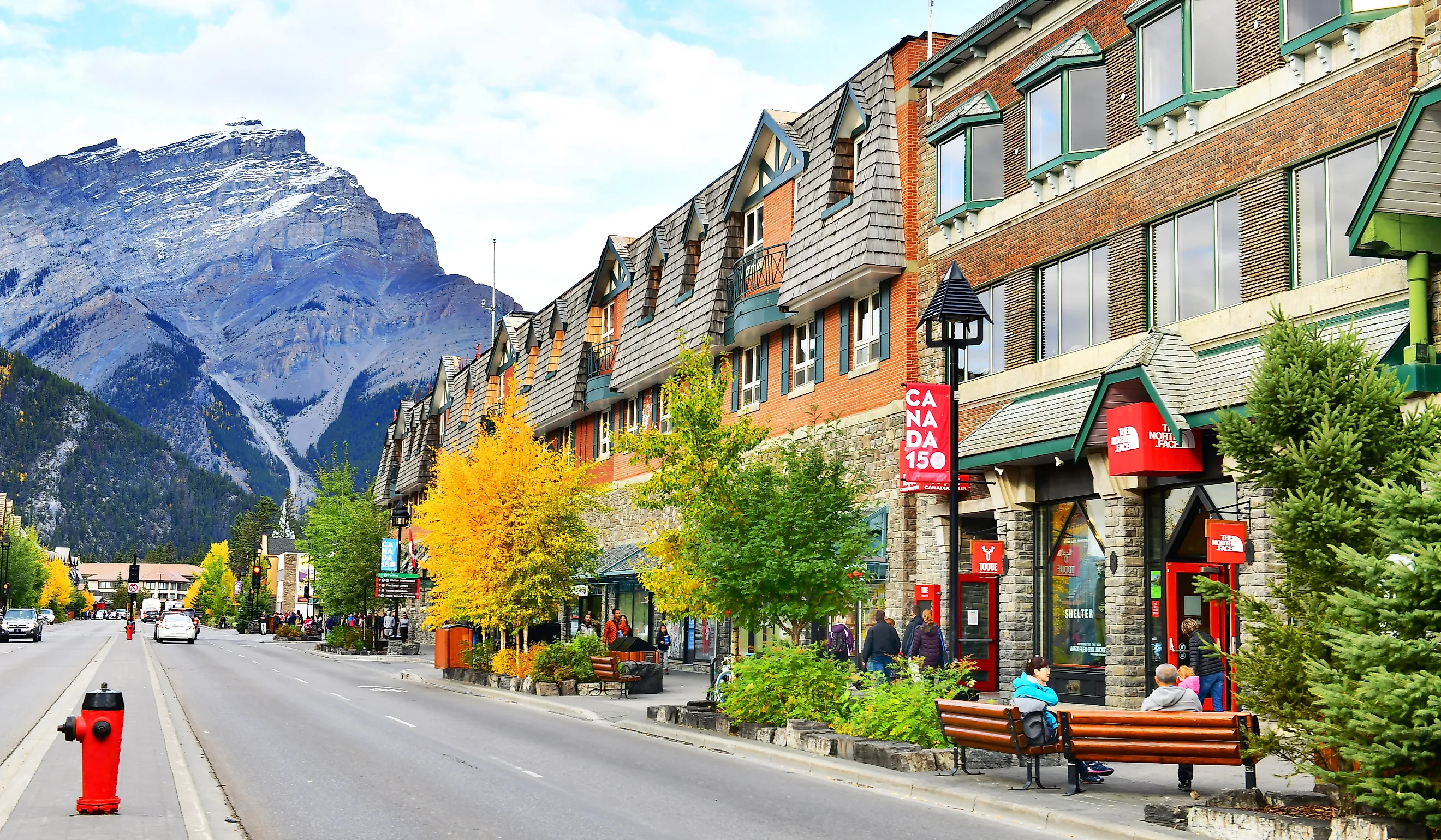 Banff Avenue in Banff, Alberta. Image credit viewfinder via Shutterstock