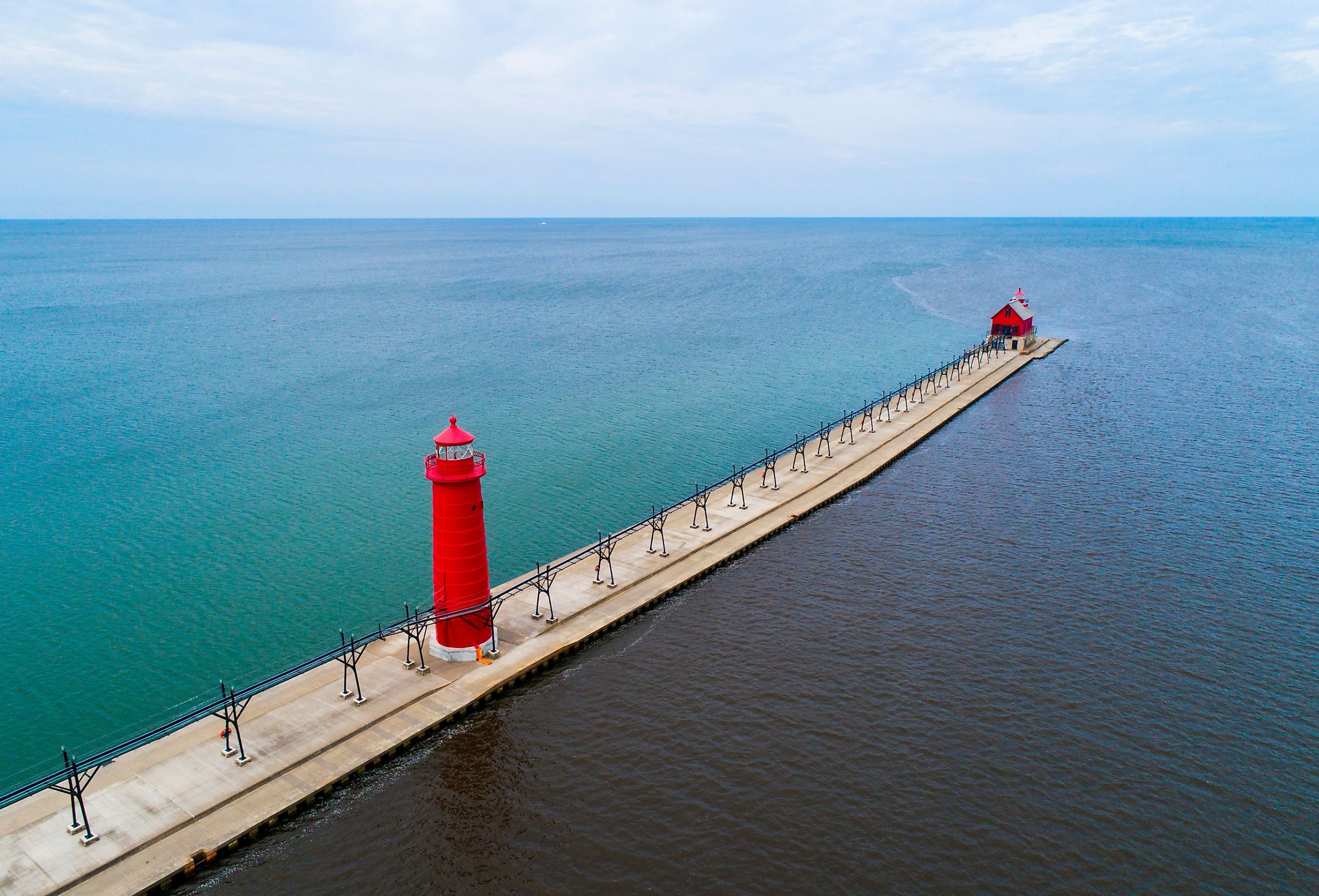 Aerial view of Grand Haven, Michigan lighthouse. Image credit Dennis MacDonald via Shutterstock.