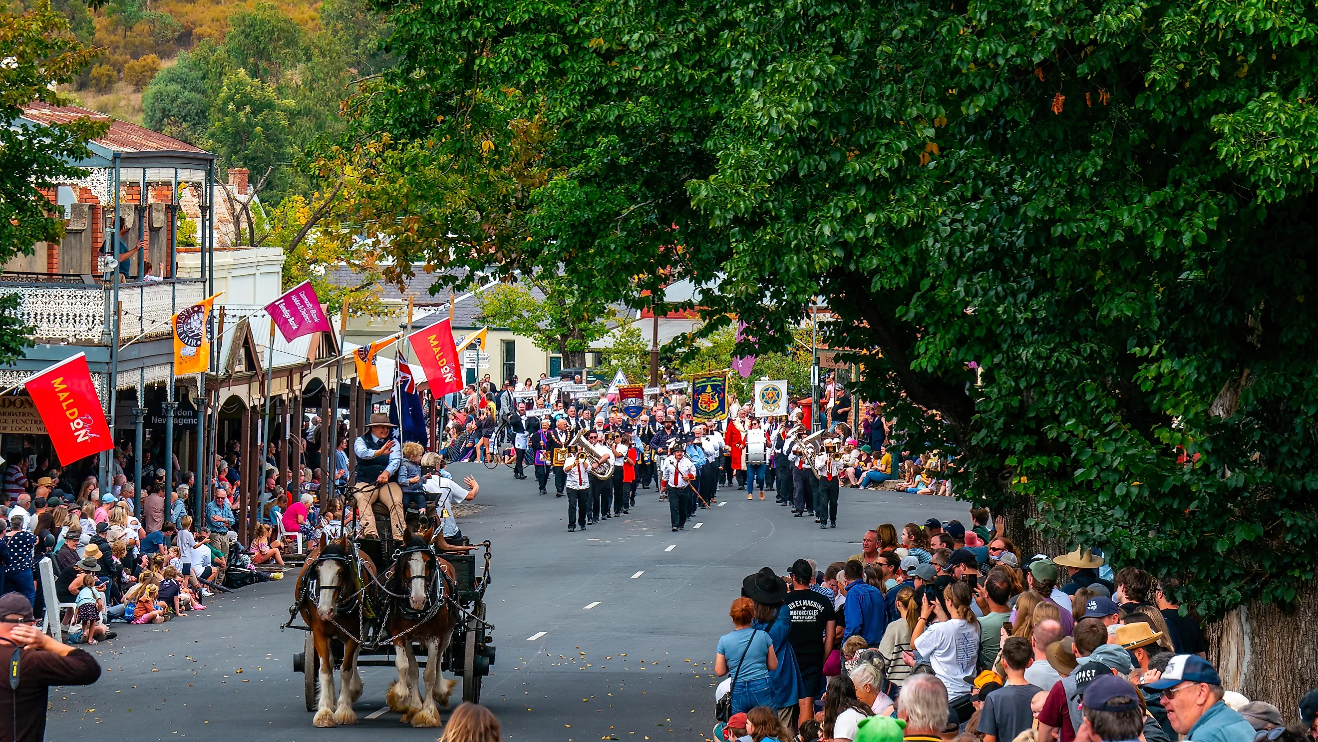 Crowds gather to see the annual Maldon Easter Procession in Maldon, Victoria, Australia. Image credit: lurchman / Shutterstock.com.