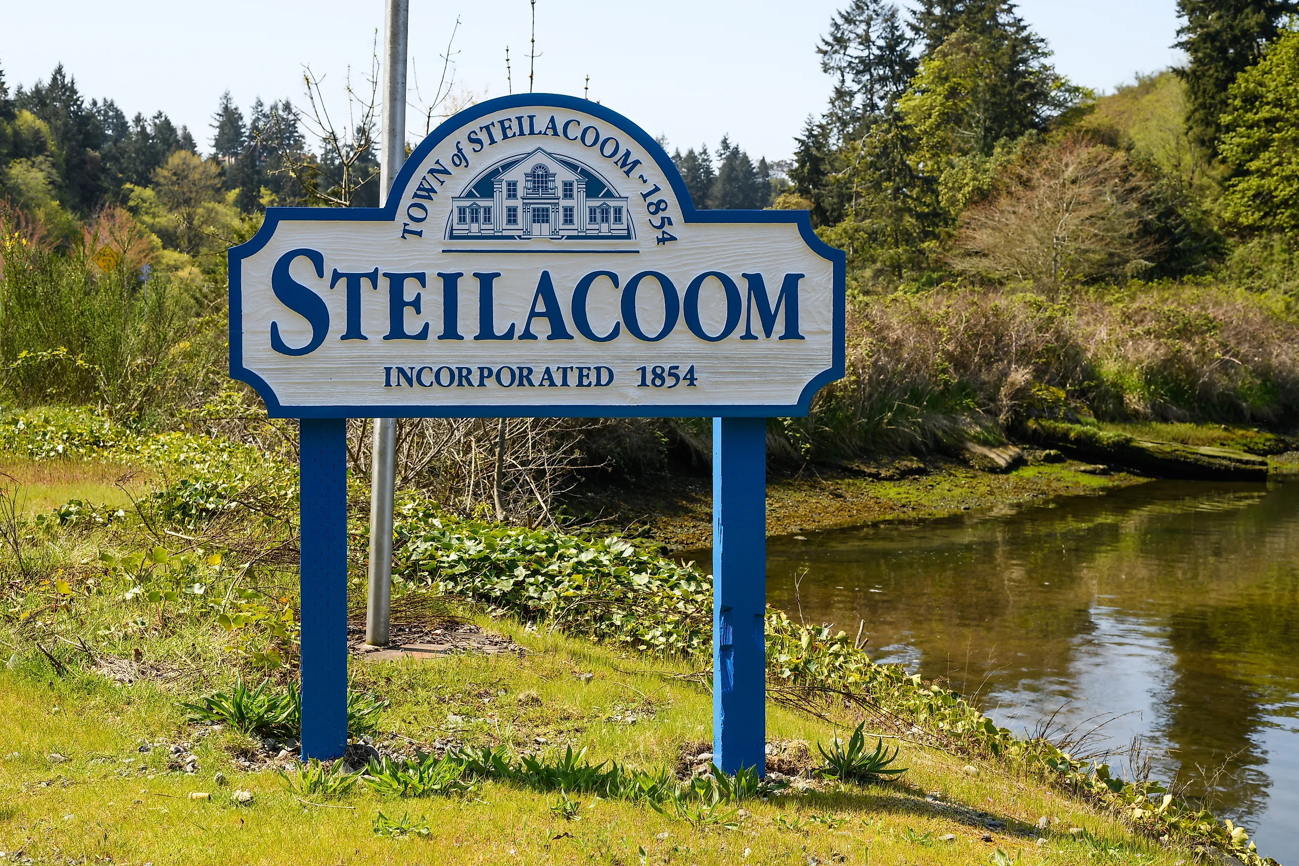 Sign post for Steilacoom, Washington. Image credit: Ian Dewar Photography / Shutterstock.com.