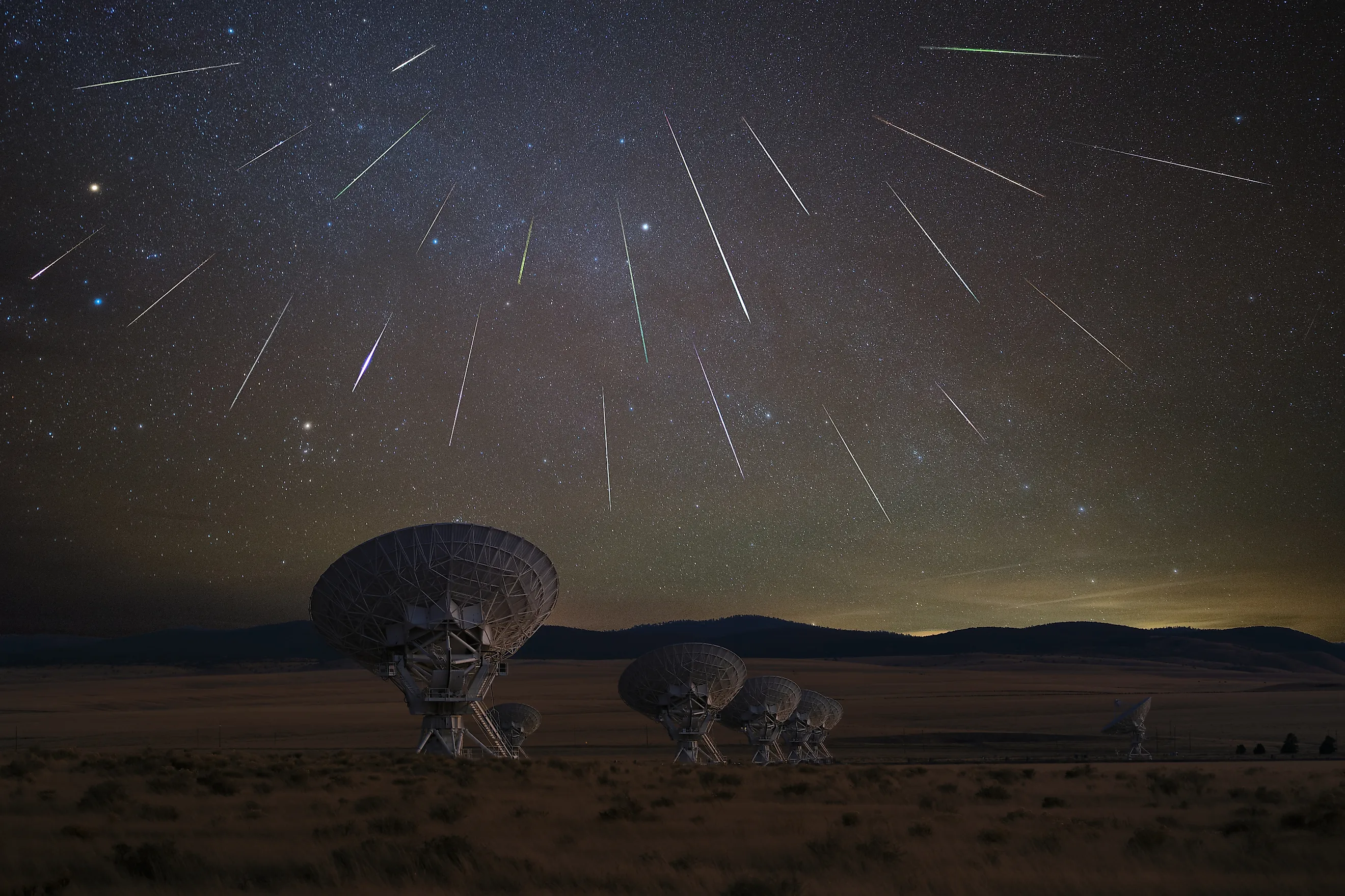 The Geminid Meteor shower taking place above the Very Large Array in New Mexico. Via Shutterstock / Liang Li Photos.