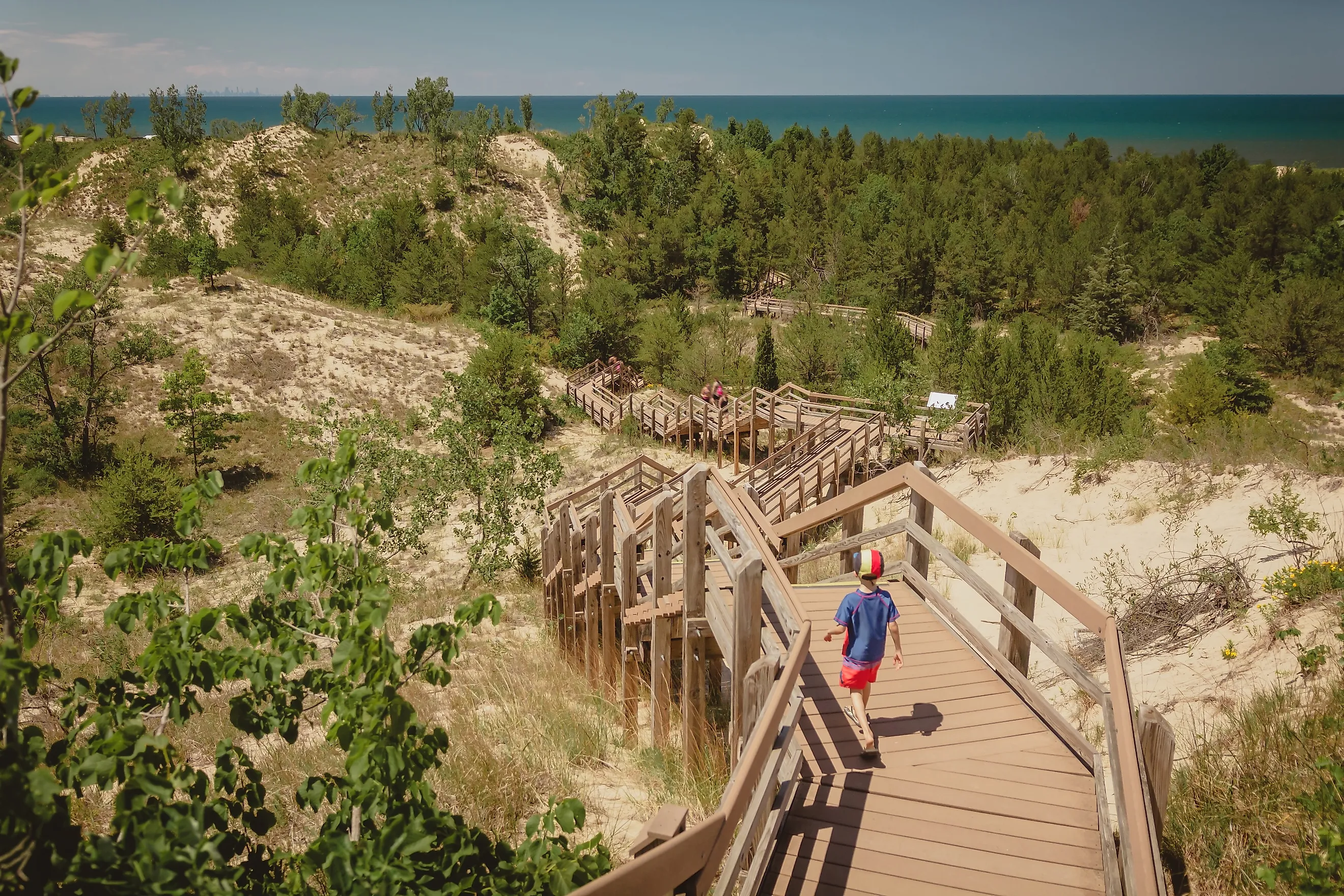 A boy hiking along a trail in the Indiana Dunes National Park, near Chesterton, Indiana.