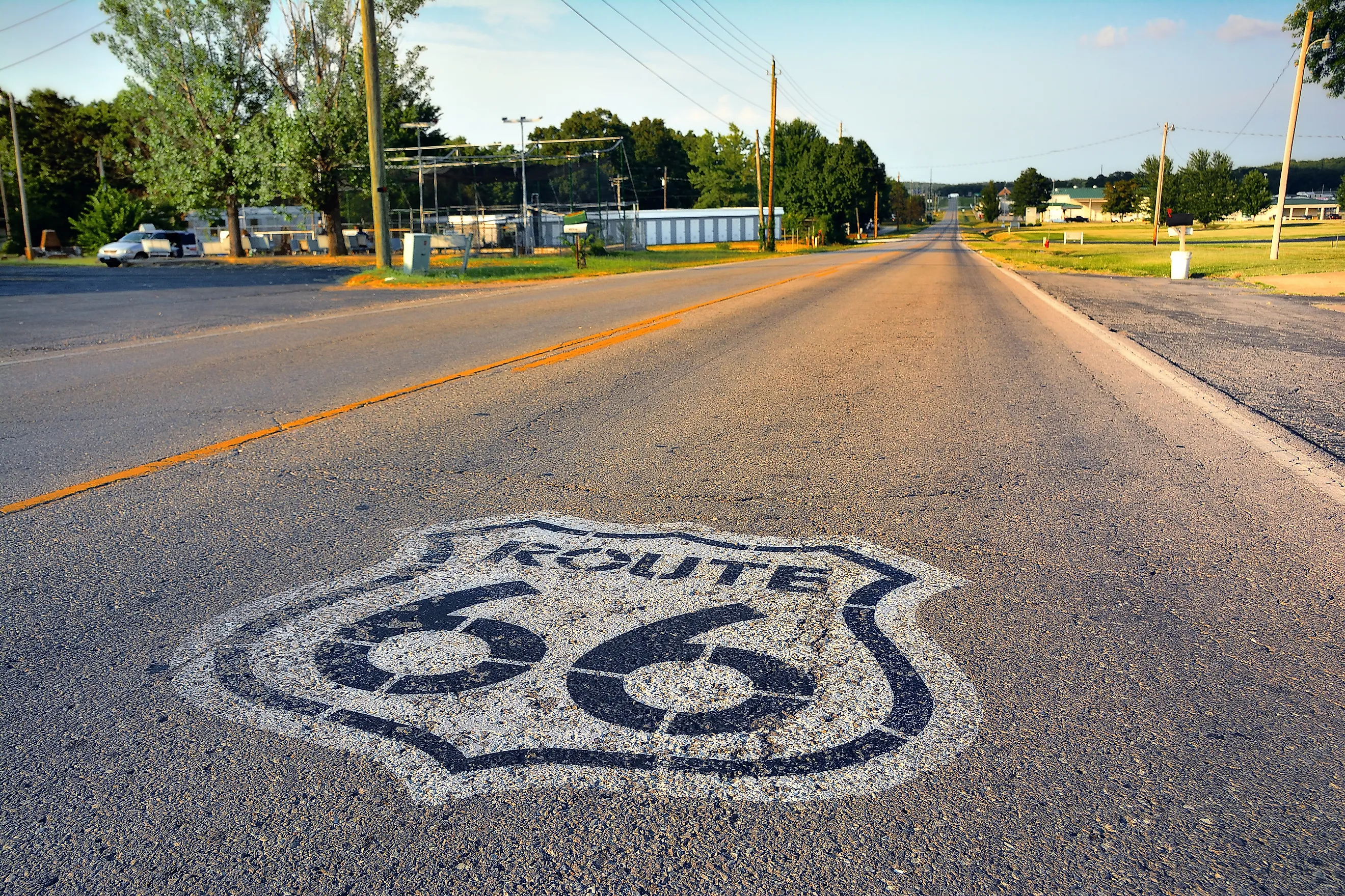 U.S. Route 66 highway, with sign on asphalt on Missouri. 