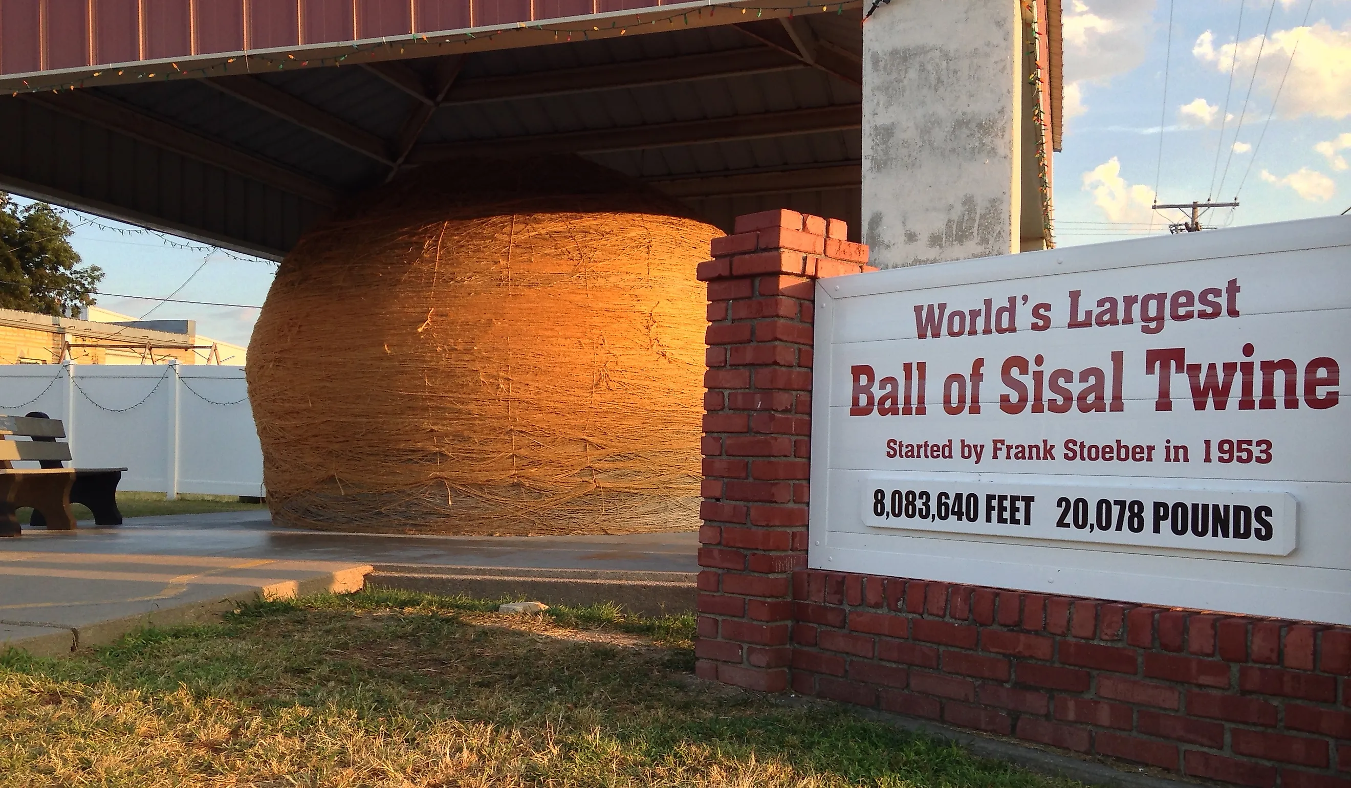 The world's largest ball of sisal twine sits proudly under a protective canopy in Cawker City, KS. Editorial credit: Larry Porges / Shutterstock.com