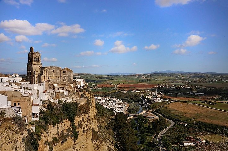 Hilly landscapes and cathedrals dominate much of Andalusia, Spain.