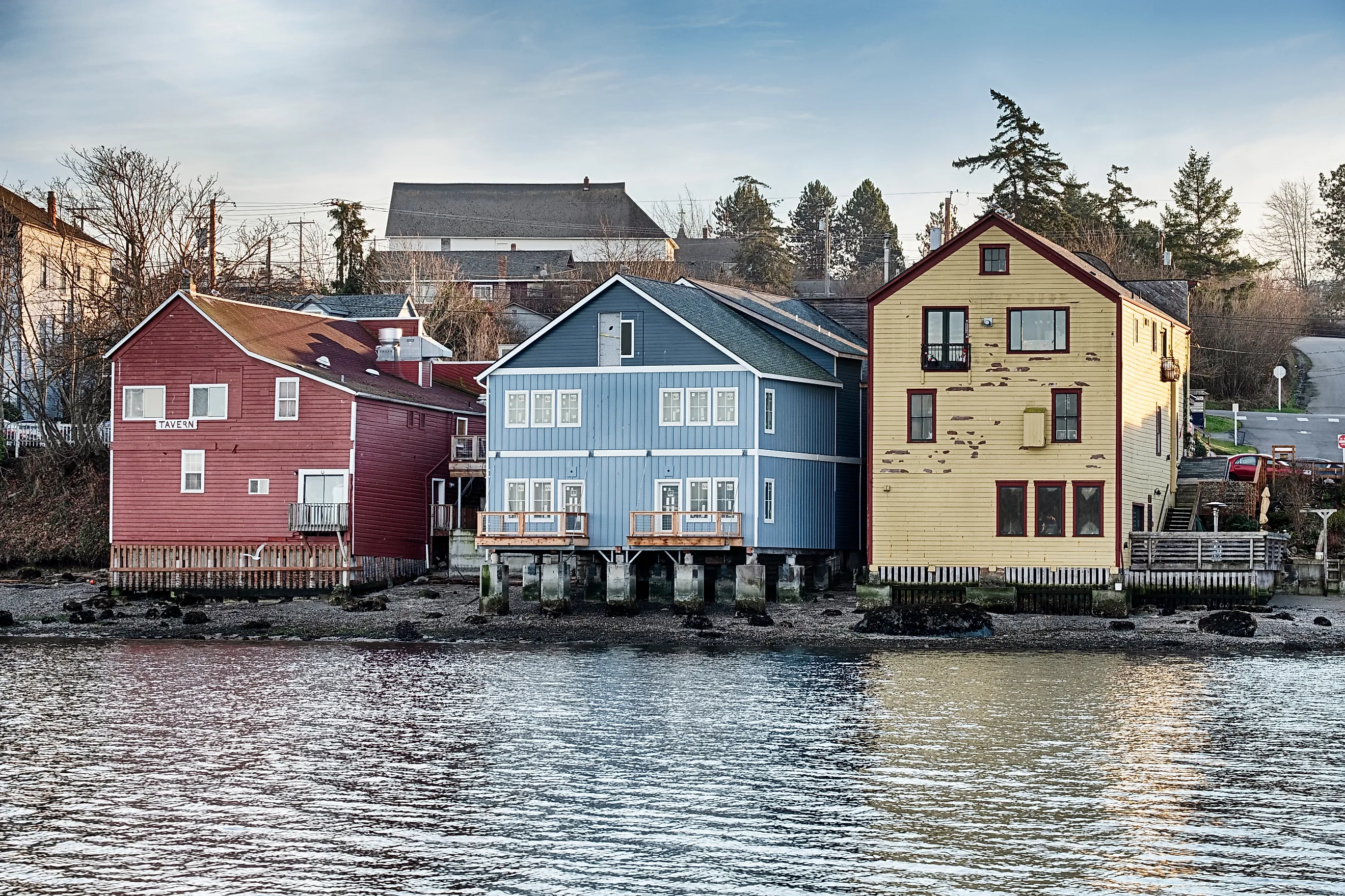 Three old buildings anchor the waterfront strip of downtown Coupeville on Whidbey Island in Washington State.